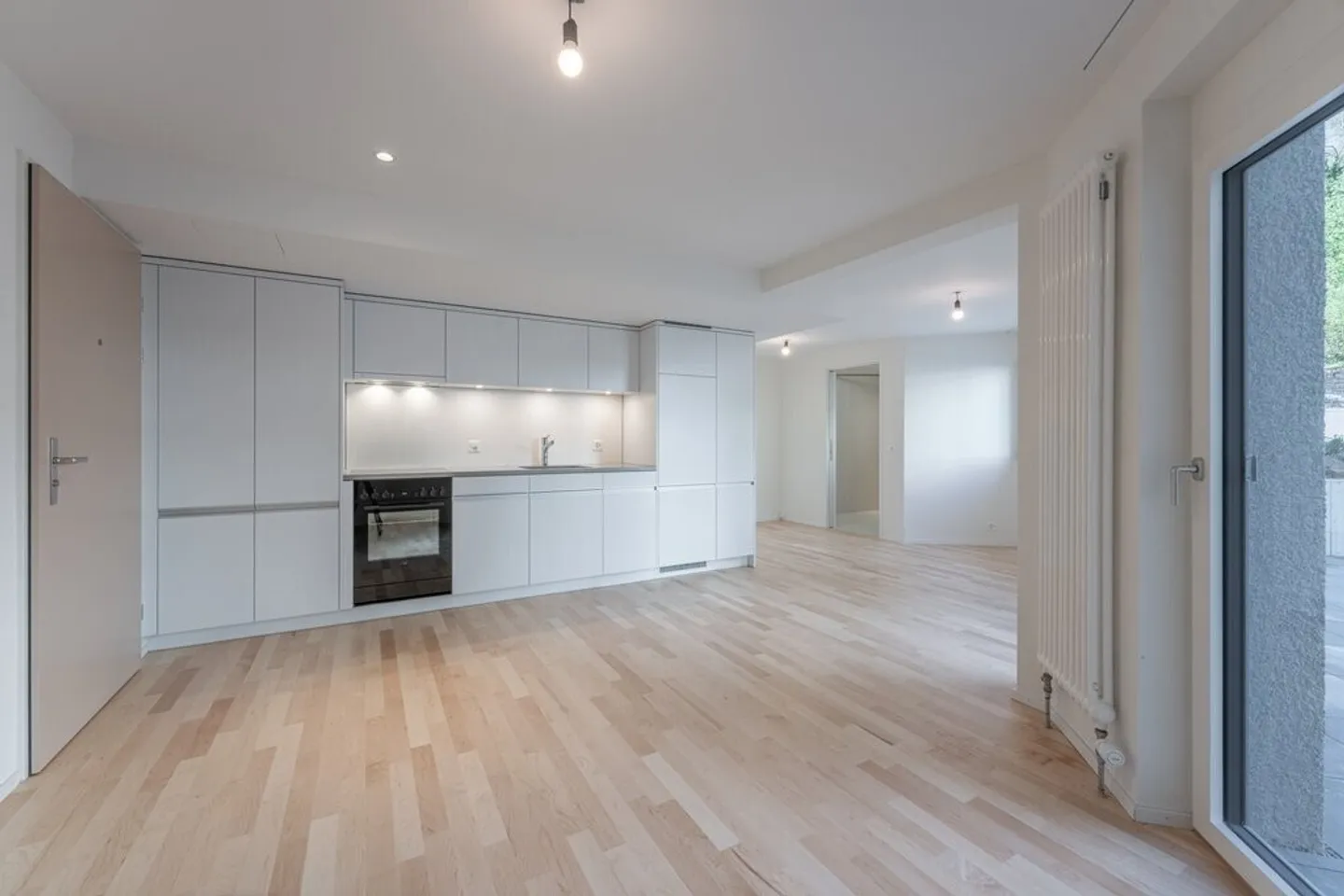 Lichtdurchflutete Parterre Wohnung in Zürich - Foto 4 von 5