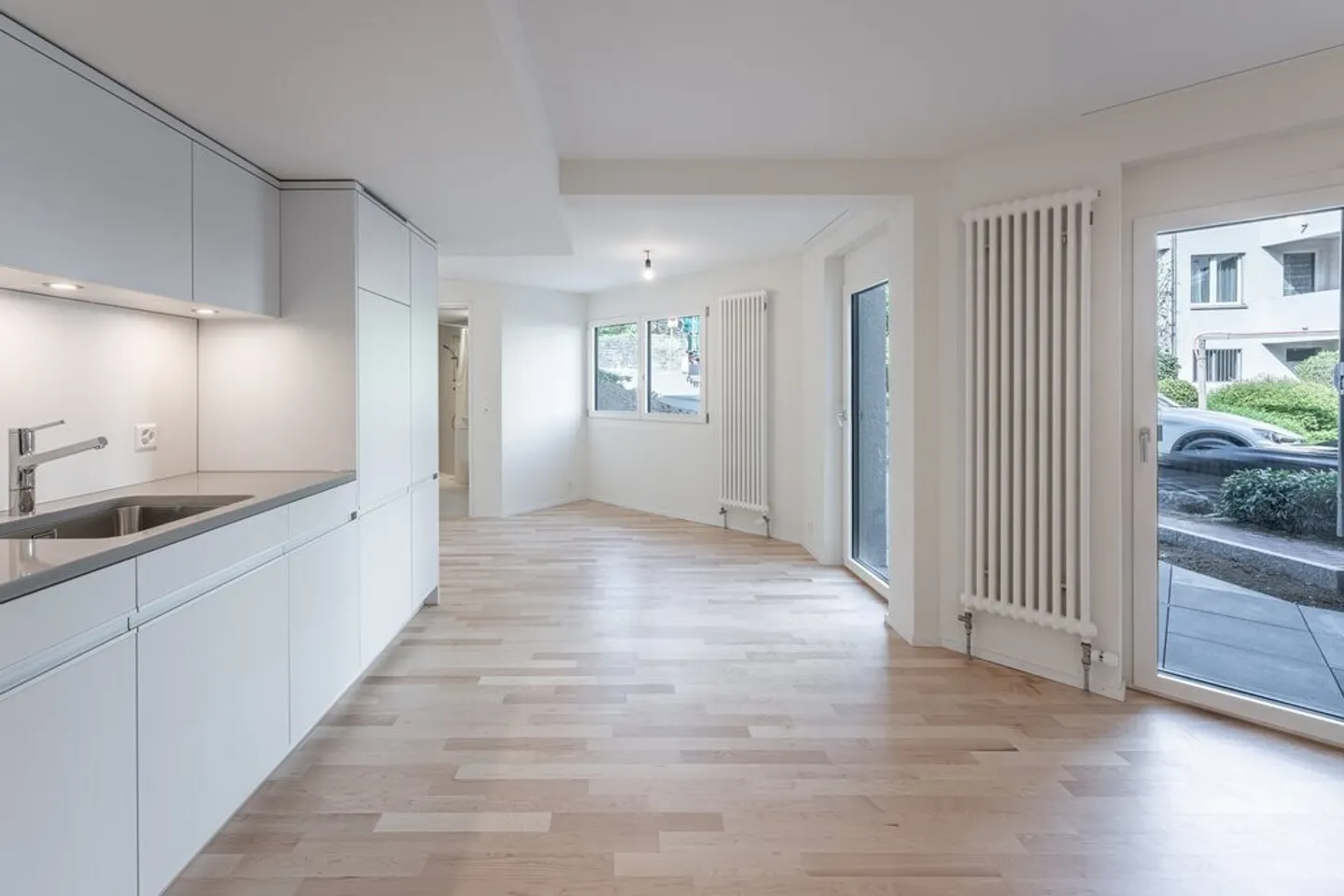 Lichtdurchflutete Parterre Wohnung in Zürich - Foto 2 von 5