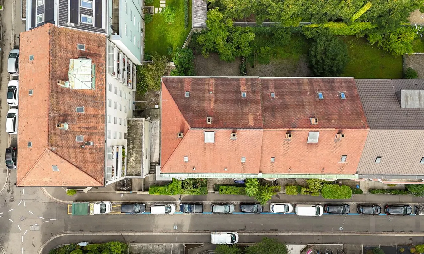 Attractive multi-family house with 9 apartments and development potential - Photo 5 of 13