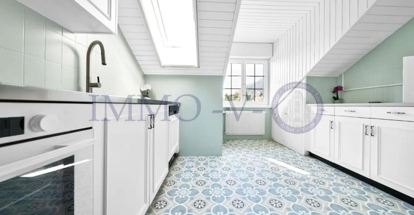 Spacious Renovated Attic with Lake View - Photo 6 of 10