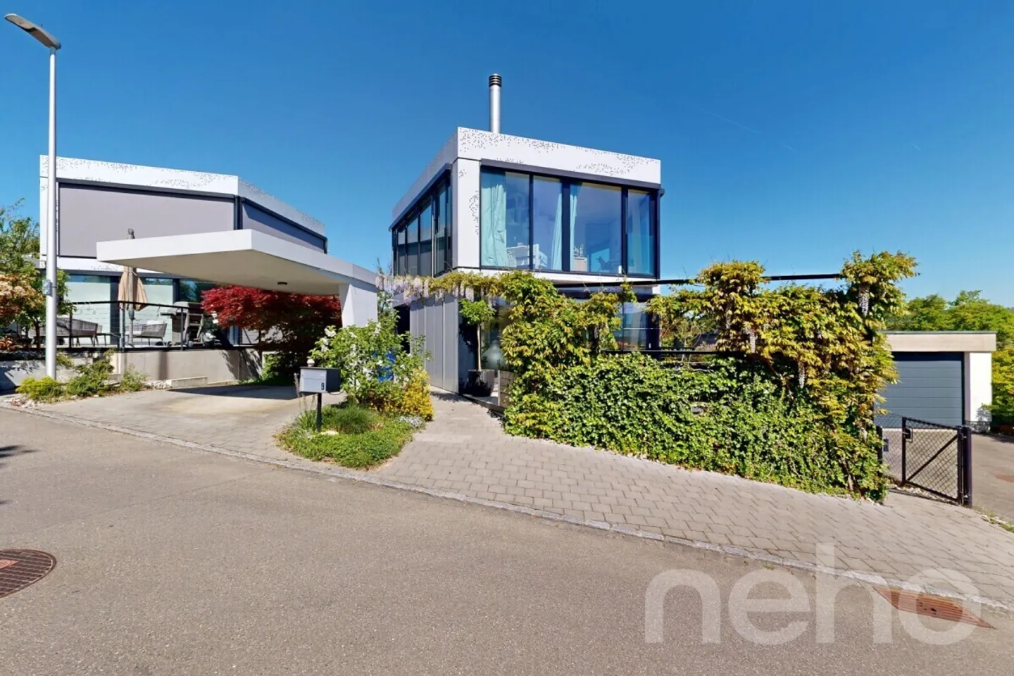 Exclusive Design House with Gallery & Impressive Glass Front - Photo 3 of 12