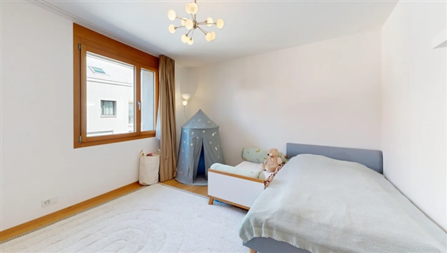 Appartamento moderno di 4,5 stanze con posto auto in diritto di costruzione - Foto 11 di 13