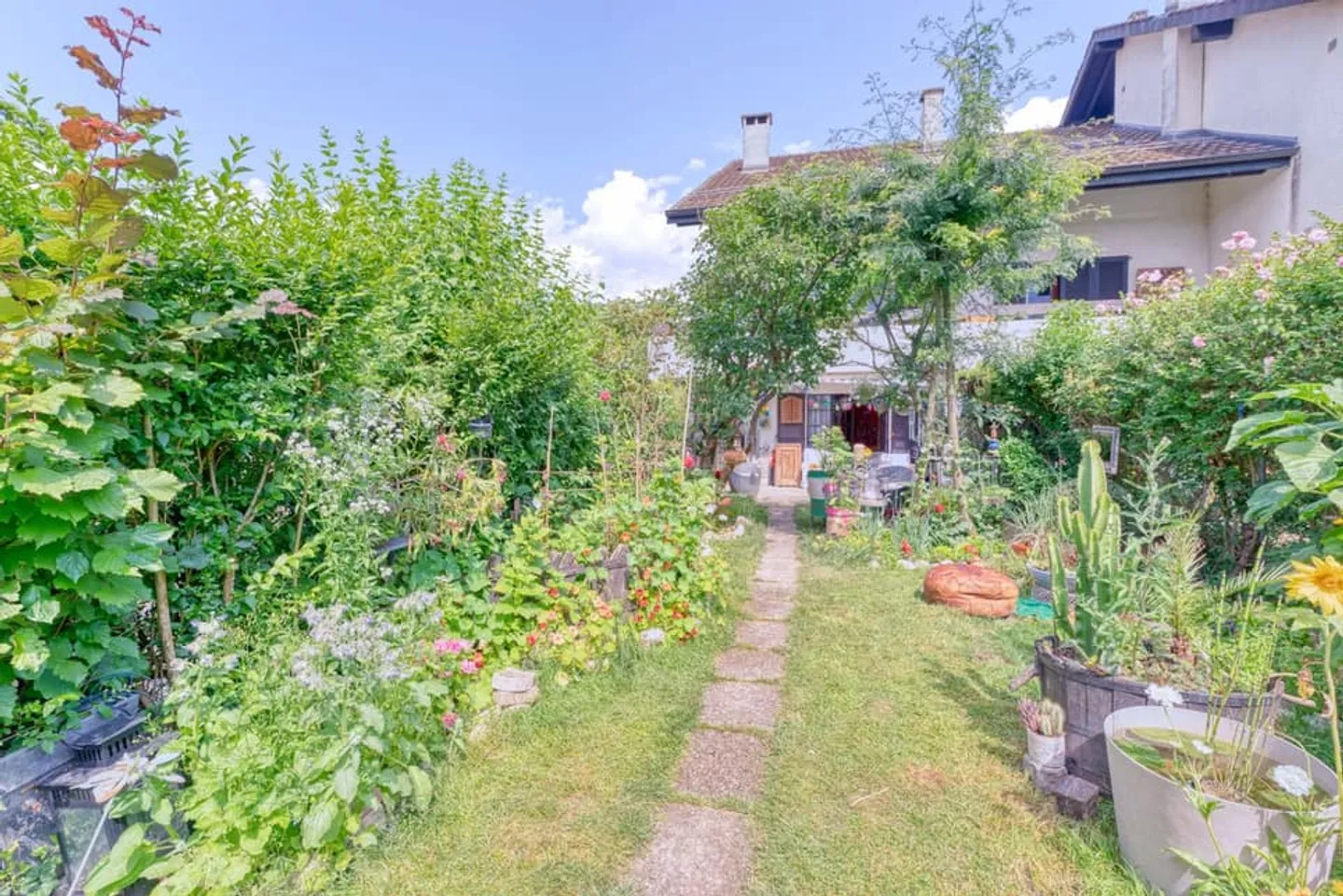 Incantevole appartamento al piano giardino in assoluta calma! - Foto 1 di 3