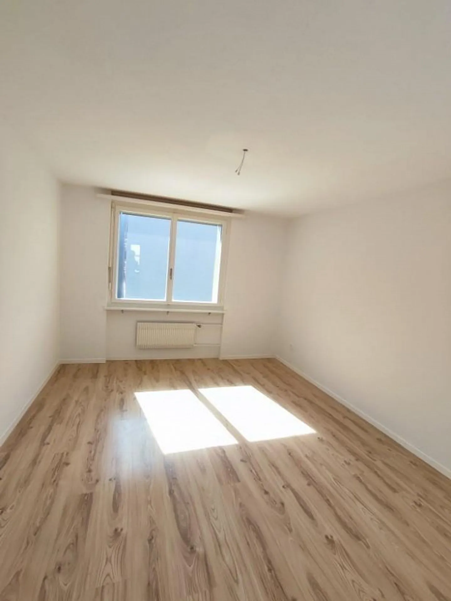 Geräumige Wohnung mit Grünblick - Foto 2 von 9