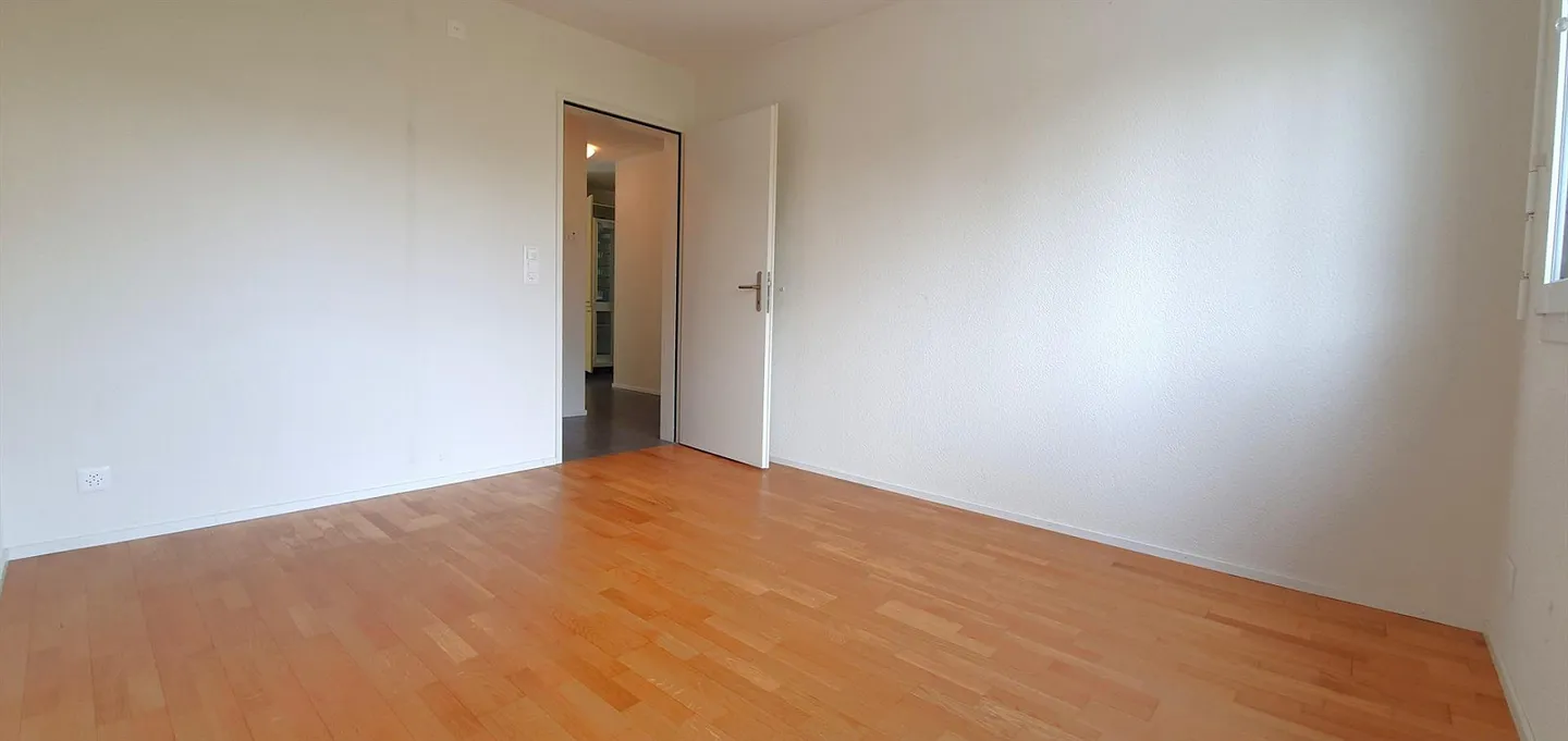 Appartamento di 3,5 stanze ben posizionato al piano terra con area giardino - Foto 11 di 24