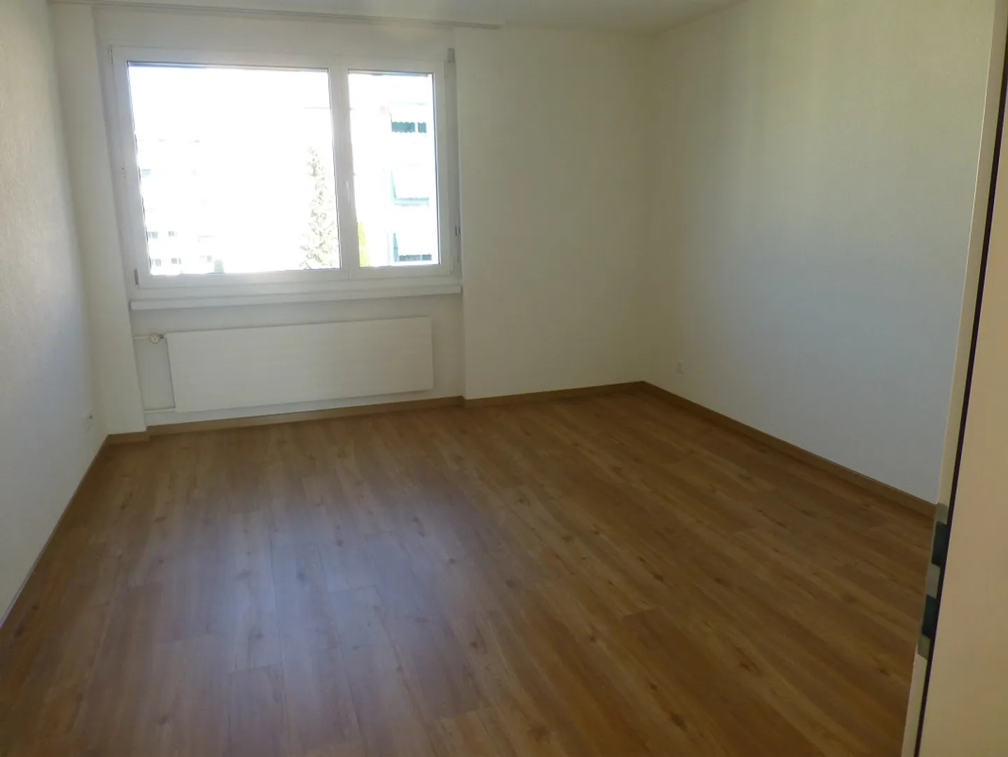 Geräumige Wohnung mit Balkon - Foto 6 von 7