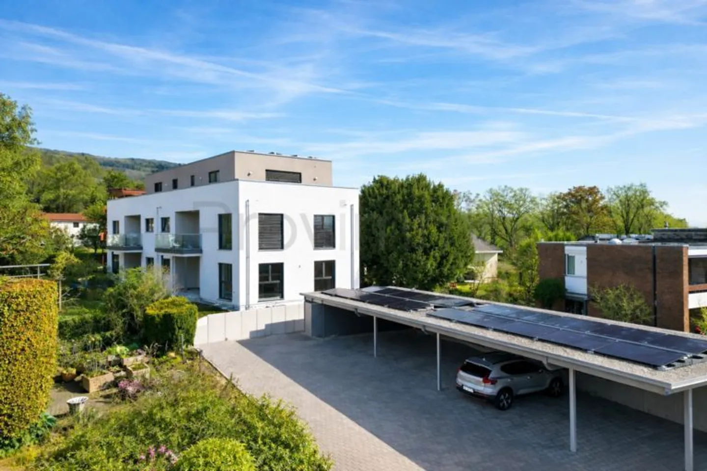 Appartement de jardin économe en énergie avec un environnement de vie ouvert et lumineux - Photo 2 sur 13