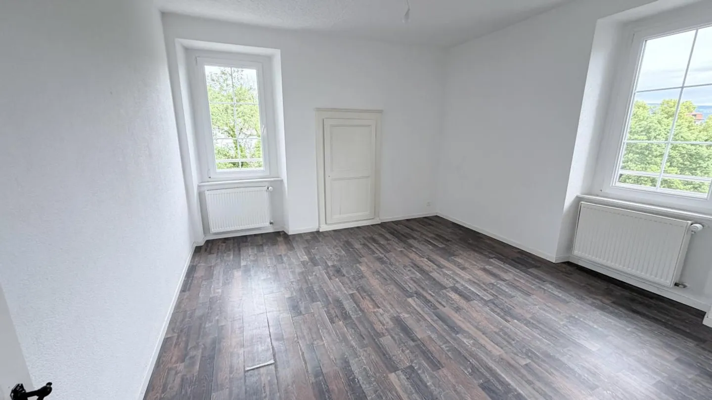 Charmant appartement 2.5 pièces - Photo 3 sur 8