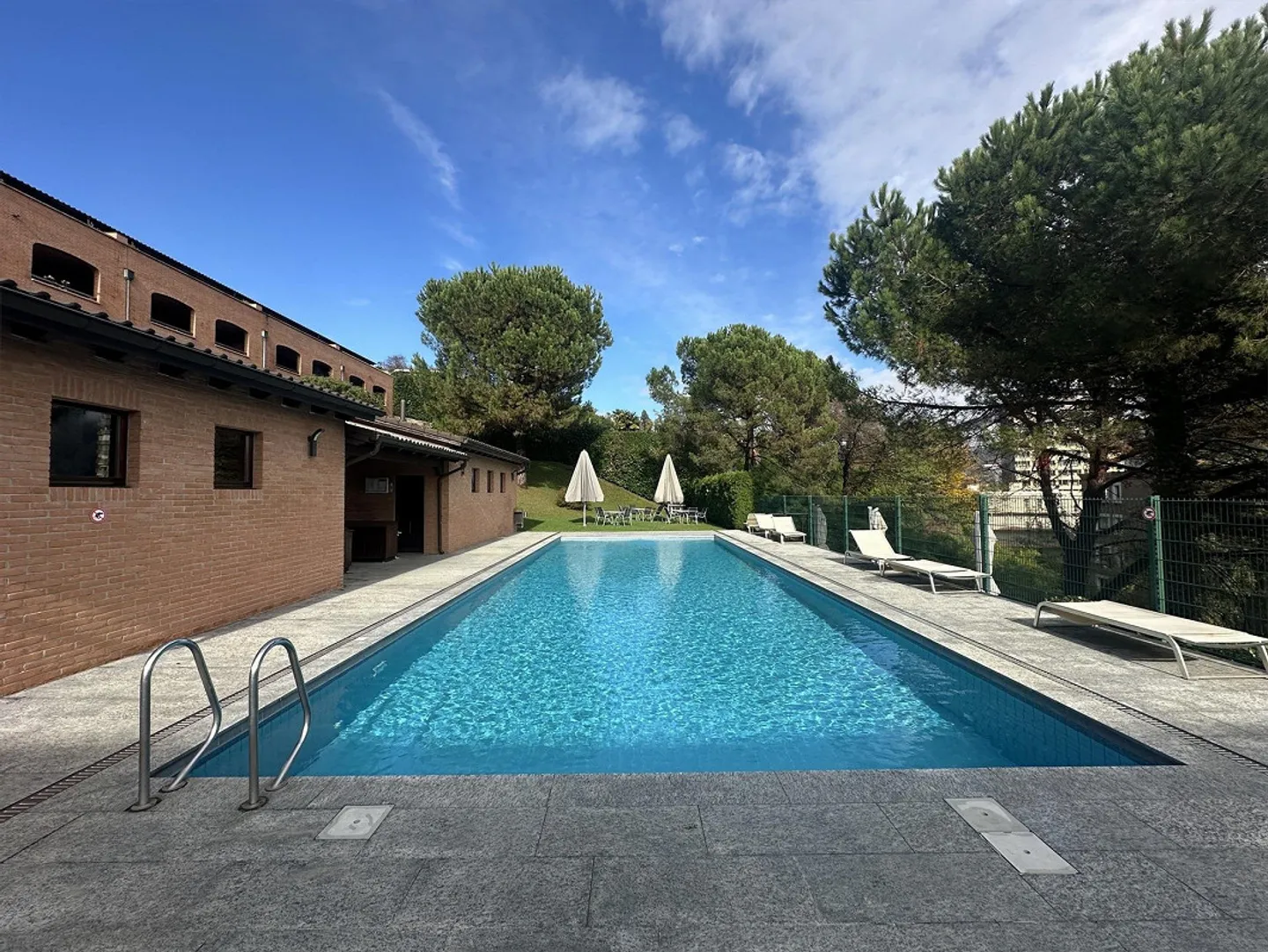 Appartement mit Seeblick und Pool - Foto 1 von 13