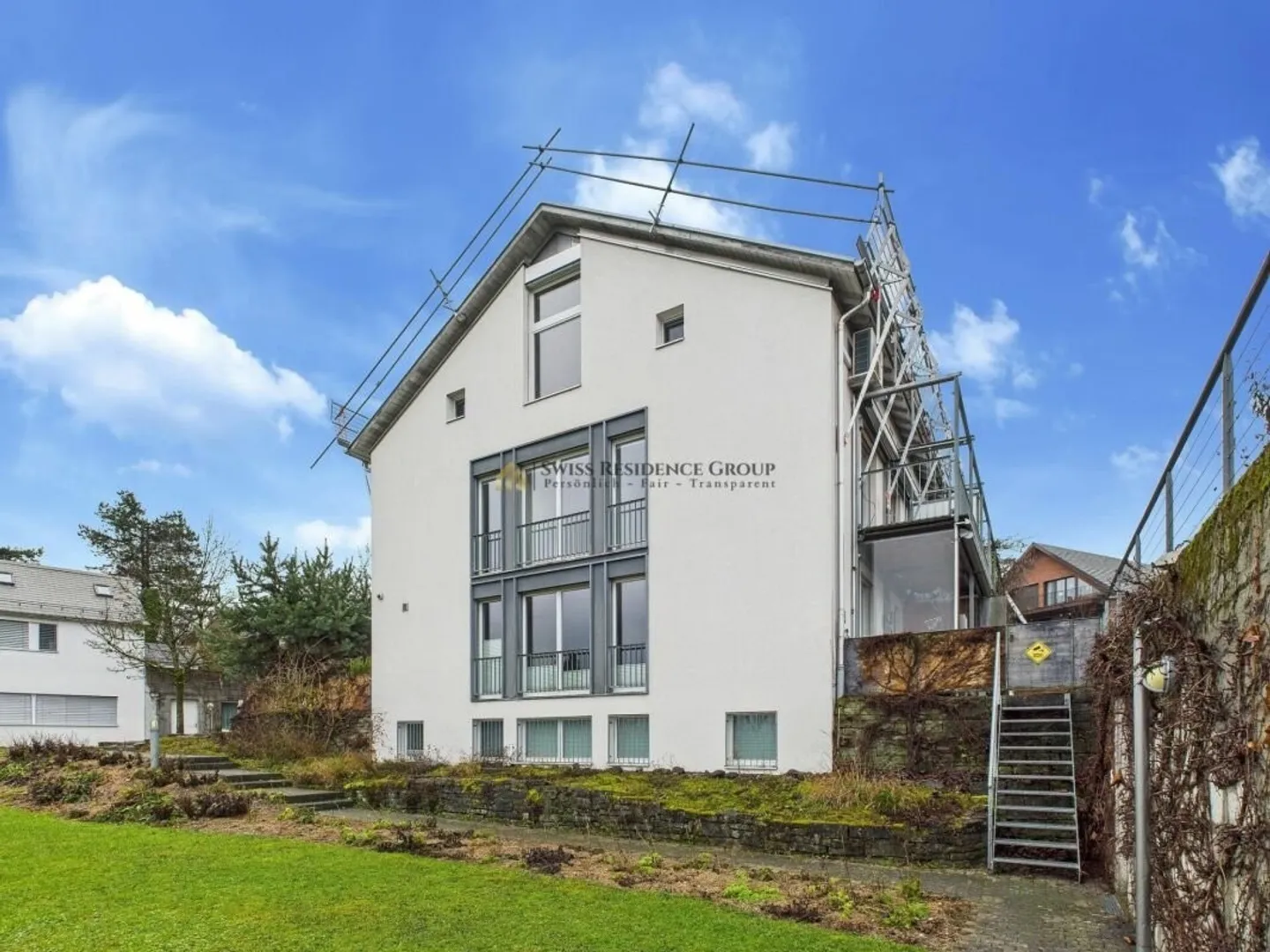 High-quality family residence with garden and unobstructed view of Lake Greifen - Photo 1 of 18