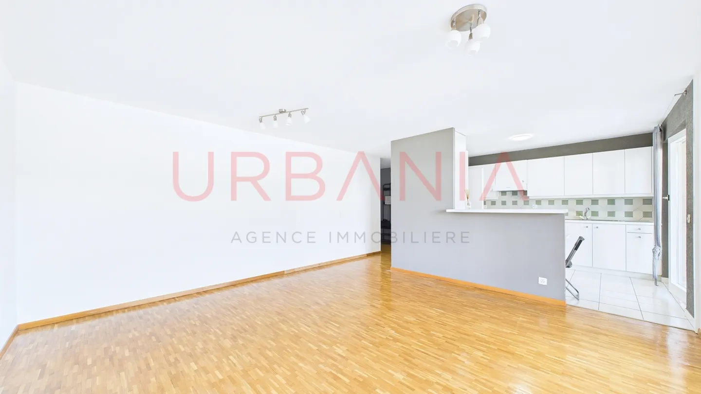 Bel appartement traversant proche des commodités - Photo 5 sur 11