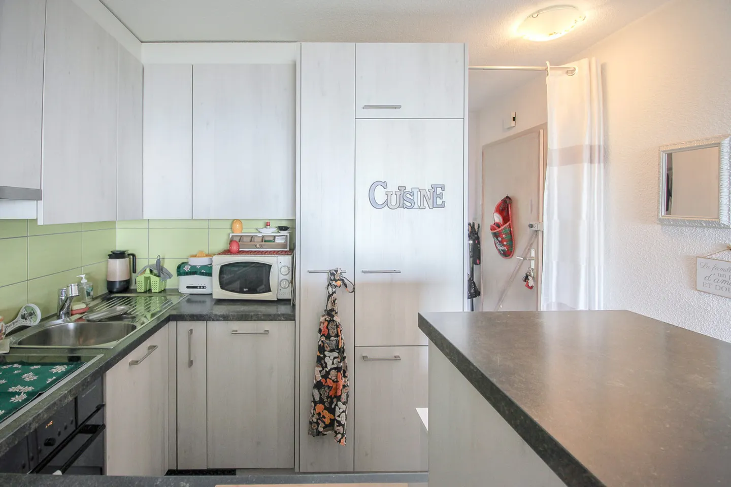 Appartement PPE rénové avec 3.5 pièces, belle terrasse et jardin - Photo 6 sur 22