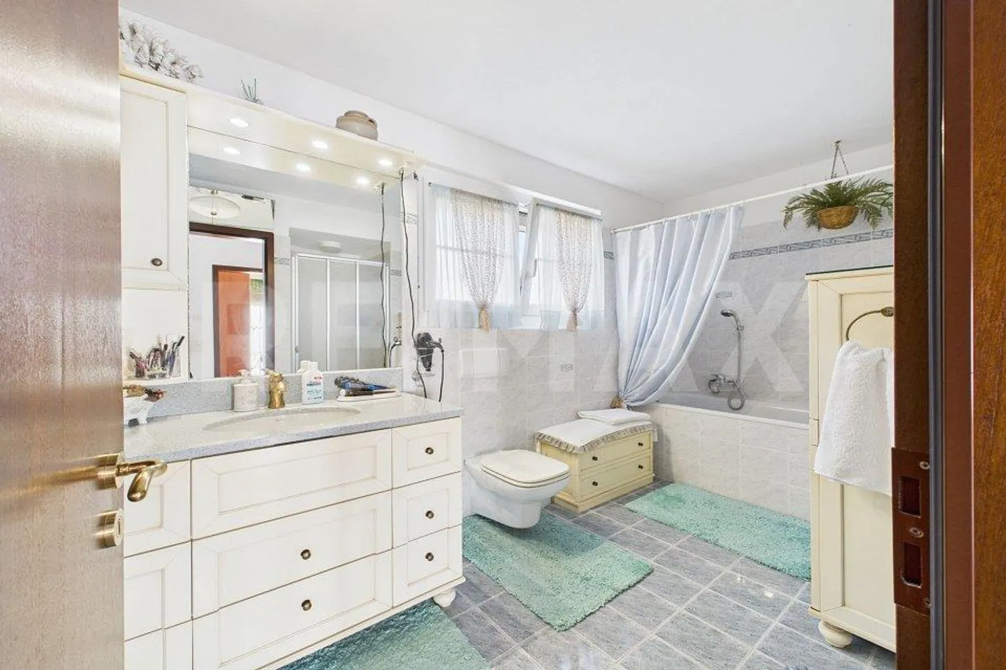 Casa bifamiliare elegante con bellissimo giardino a Bedano - Foto 8 di 13