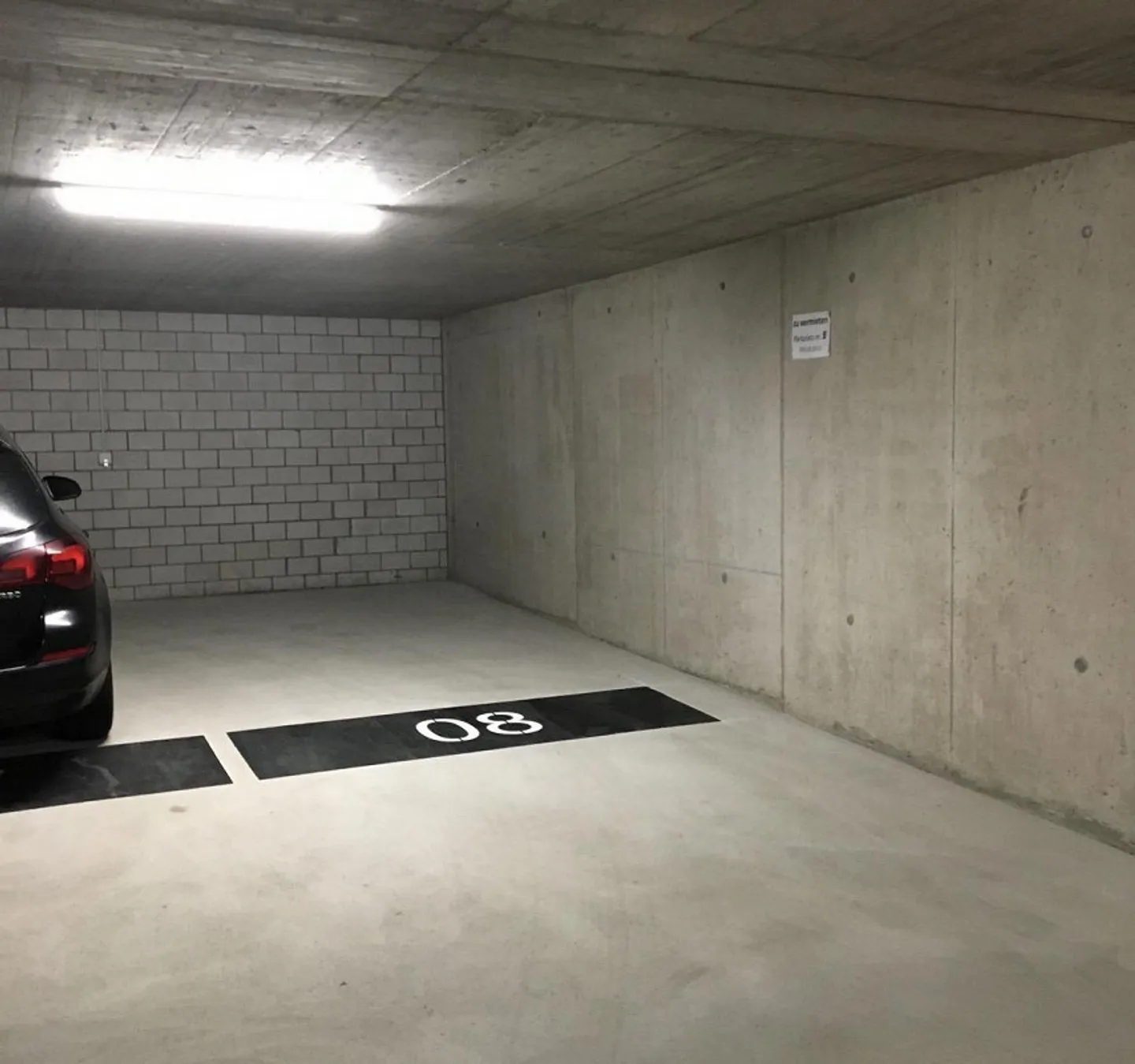 Place de parking à louer dans le centre de Kloten garage souterrain (nouvelle construction) - Photo 1 sur 5