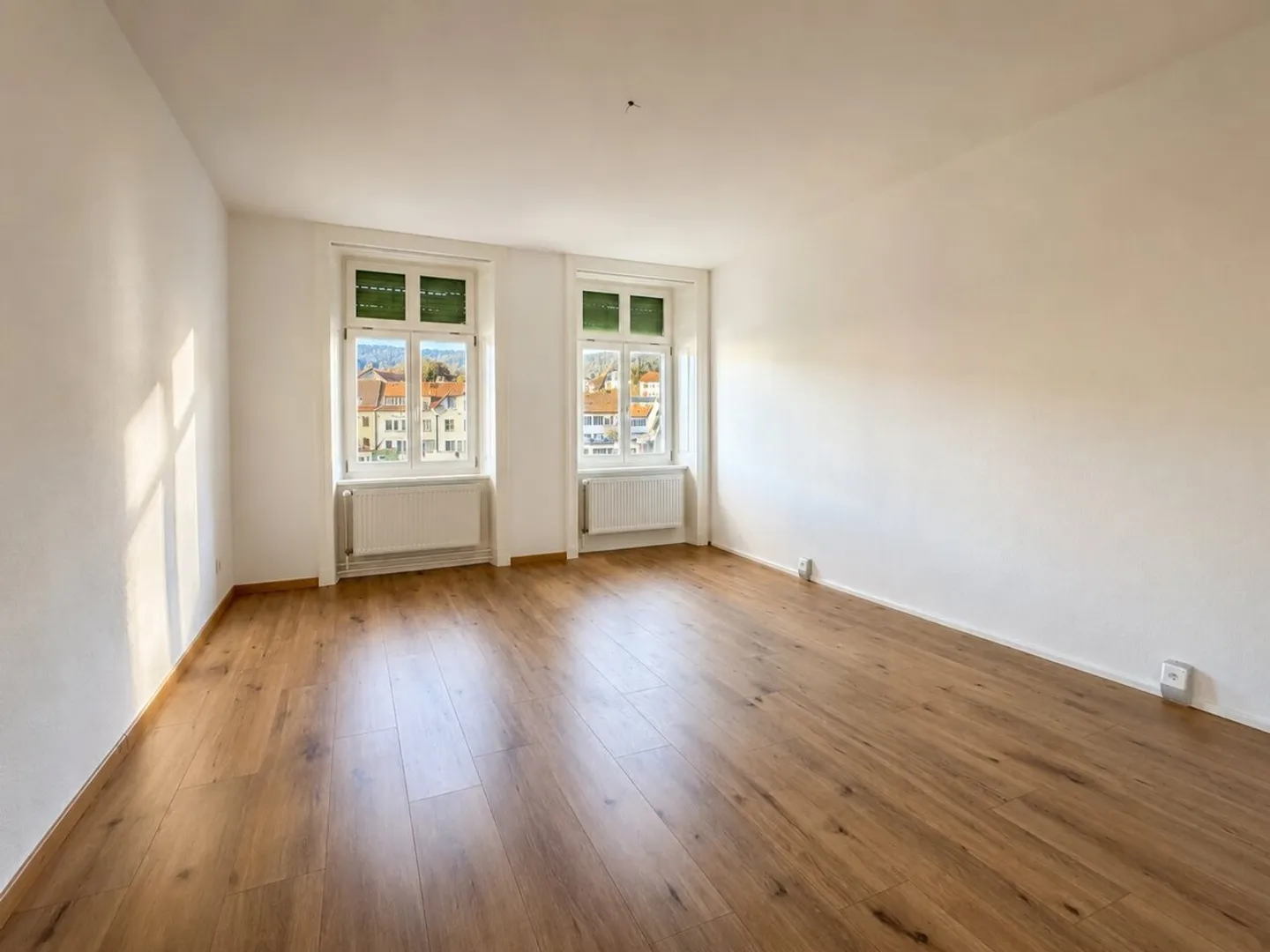 Charmant appartement 4.5 pièces rénové avec garage - Foto 3 von 19