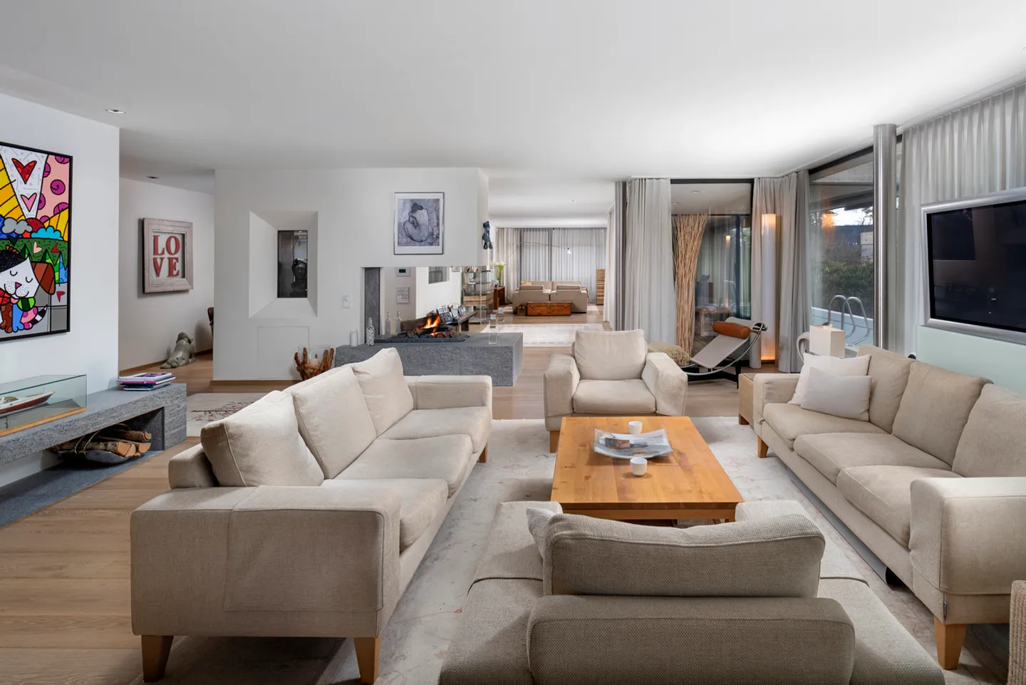 Vie exclusive dans un parc : Appartement de jardin représentatif - Photo 2 sur 9