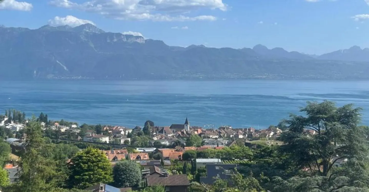 Appartement Attique de Luxe avec Vue sur le Lac - Photo 1 sur 4