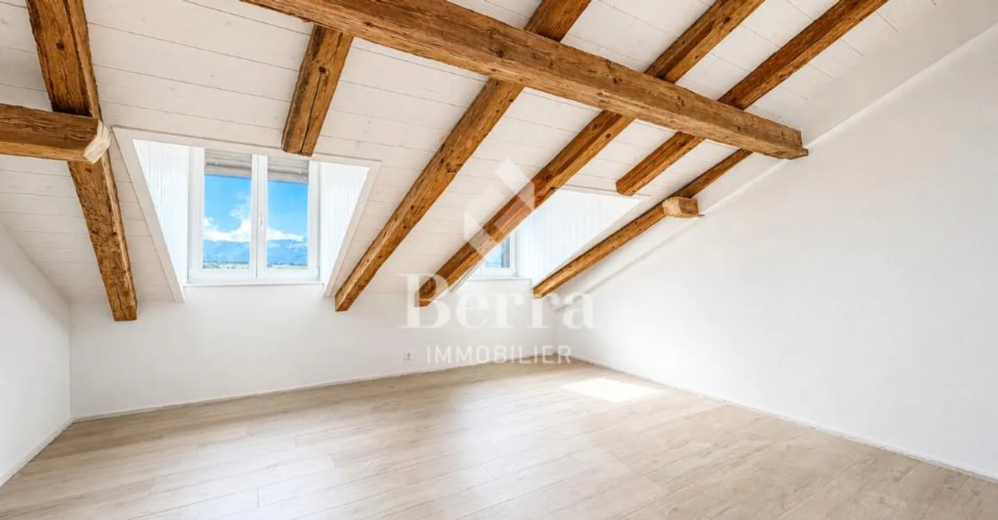 Charmant Appartement en Attique - Photo 2 sur 11