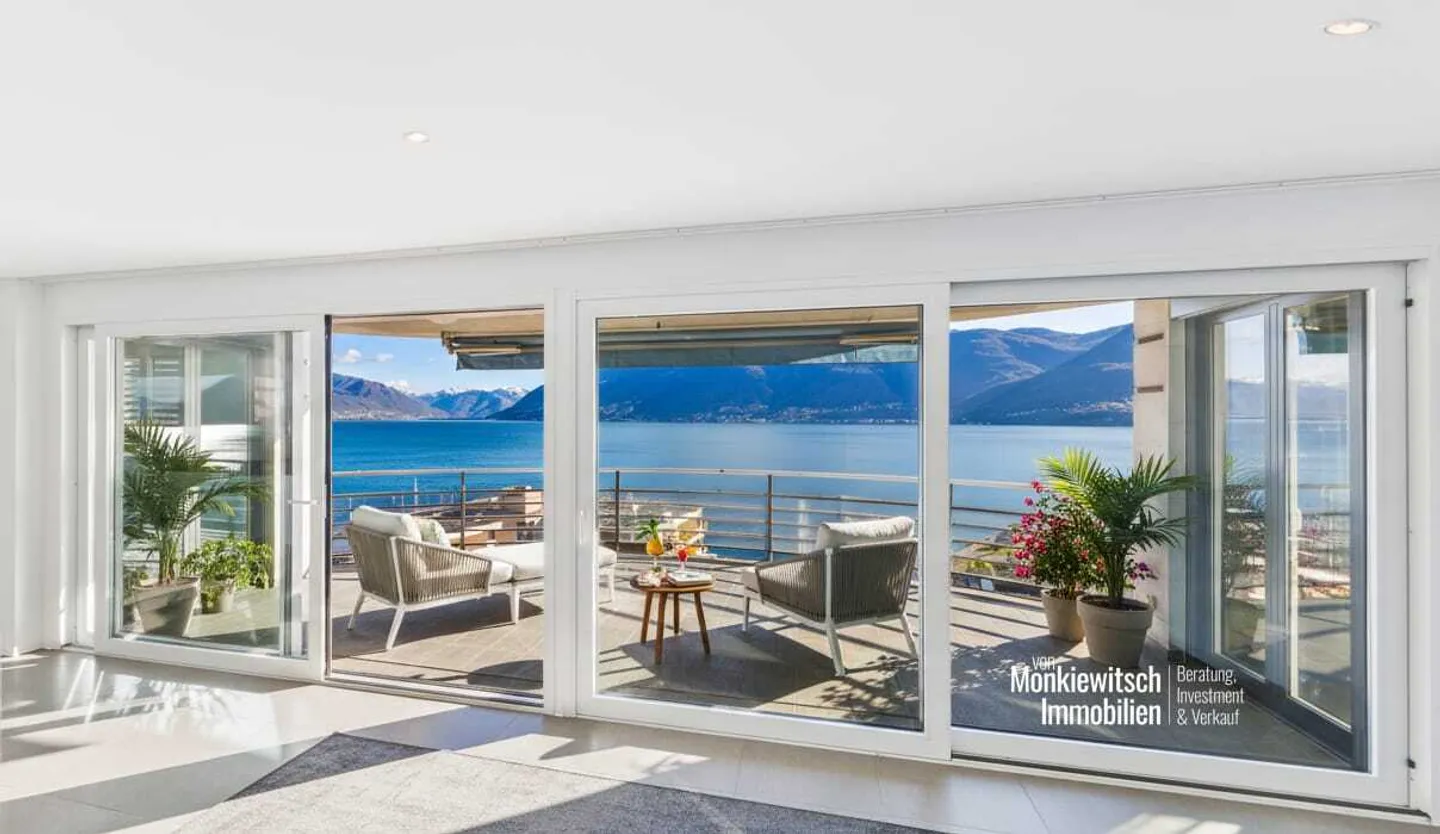 Beeindruckendes Penthouse mit Seeblick - Foto 1 von 13