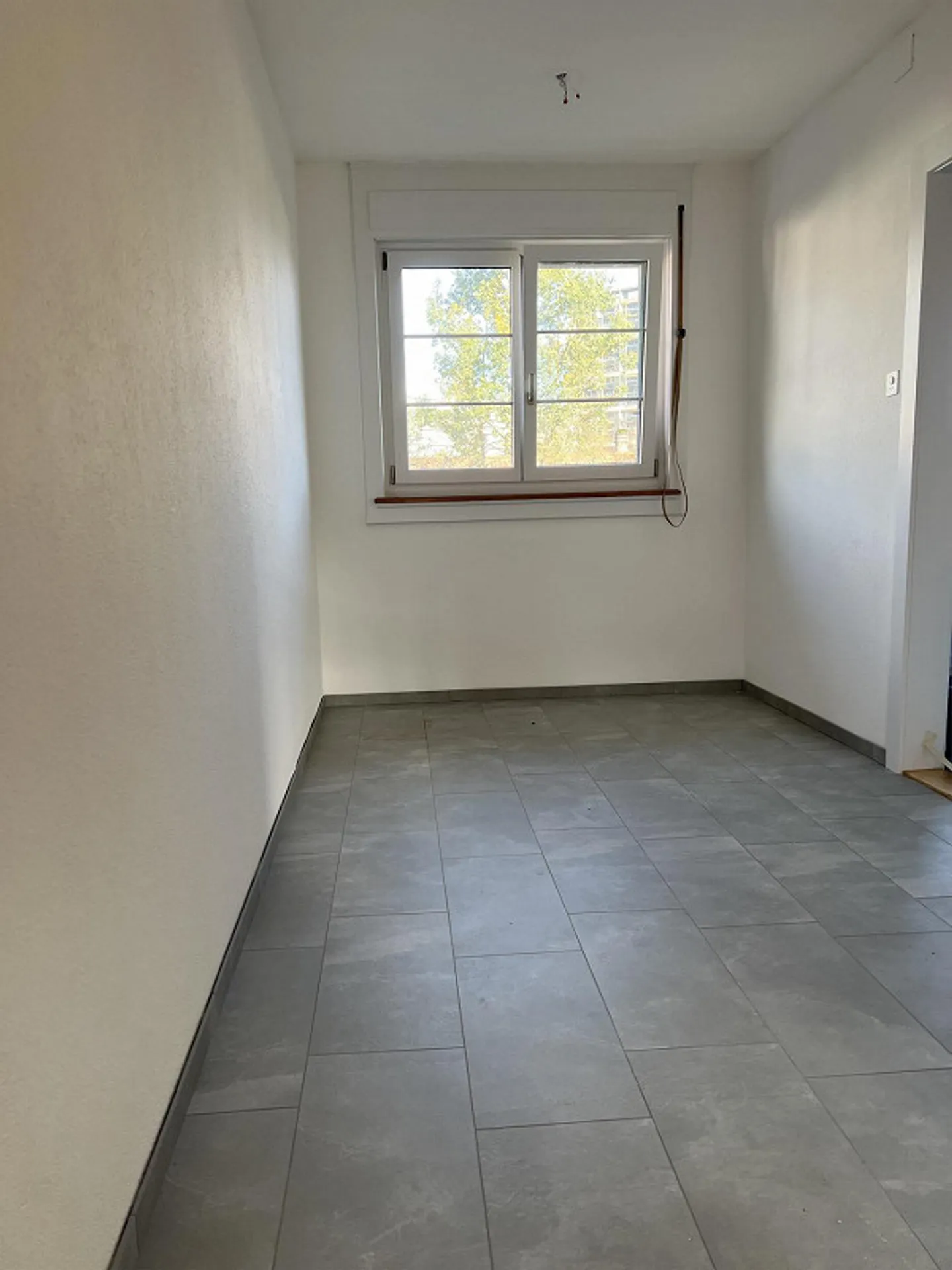 Appartement 2.5 pièces récemment rénové - Photo 3 sur 7