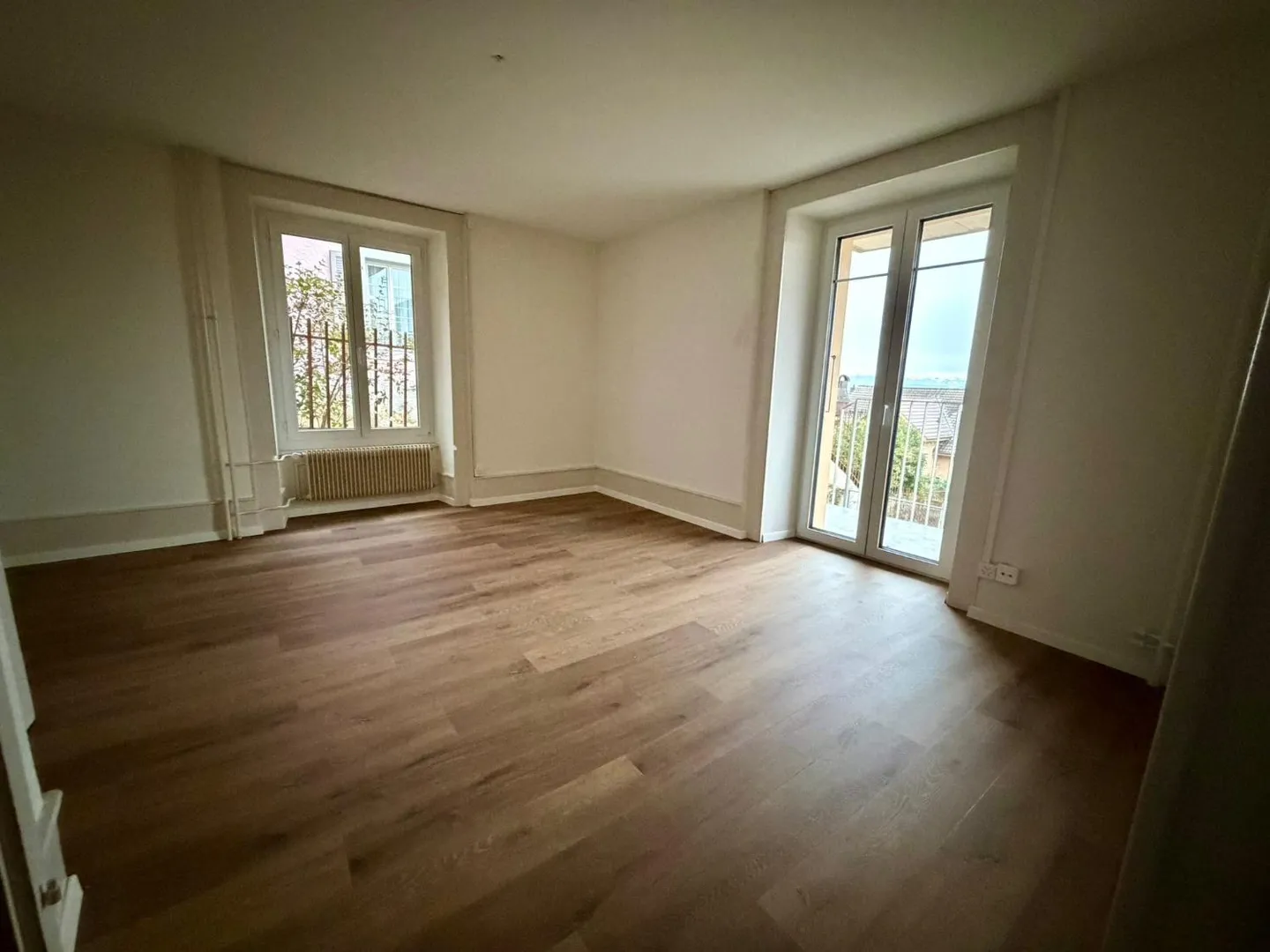 Charming 3-room apartment in Neuchâtel – Elevated ground floor with balcony - Photo 1 of 4