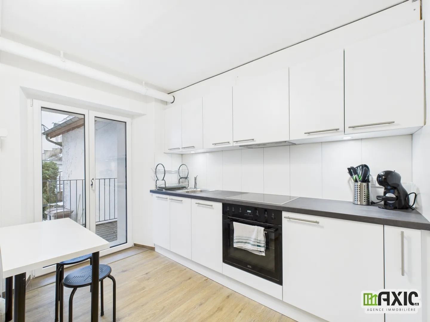 Möblierte 2,5-Zimmer-Wohnung im Herzen von Delémont mit Balkon - Foto 9 von 12