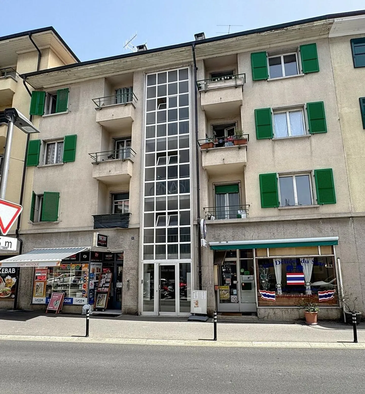 Income-Generating Building Ideally Located in the Center of RENENS - Photo 1 of 5