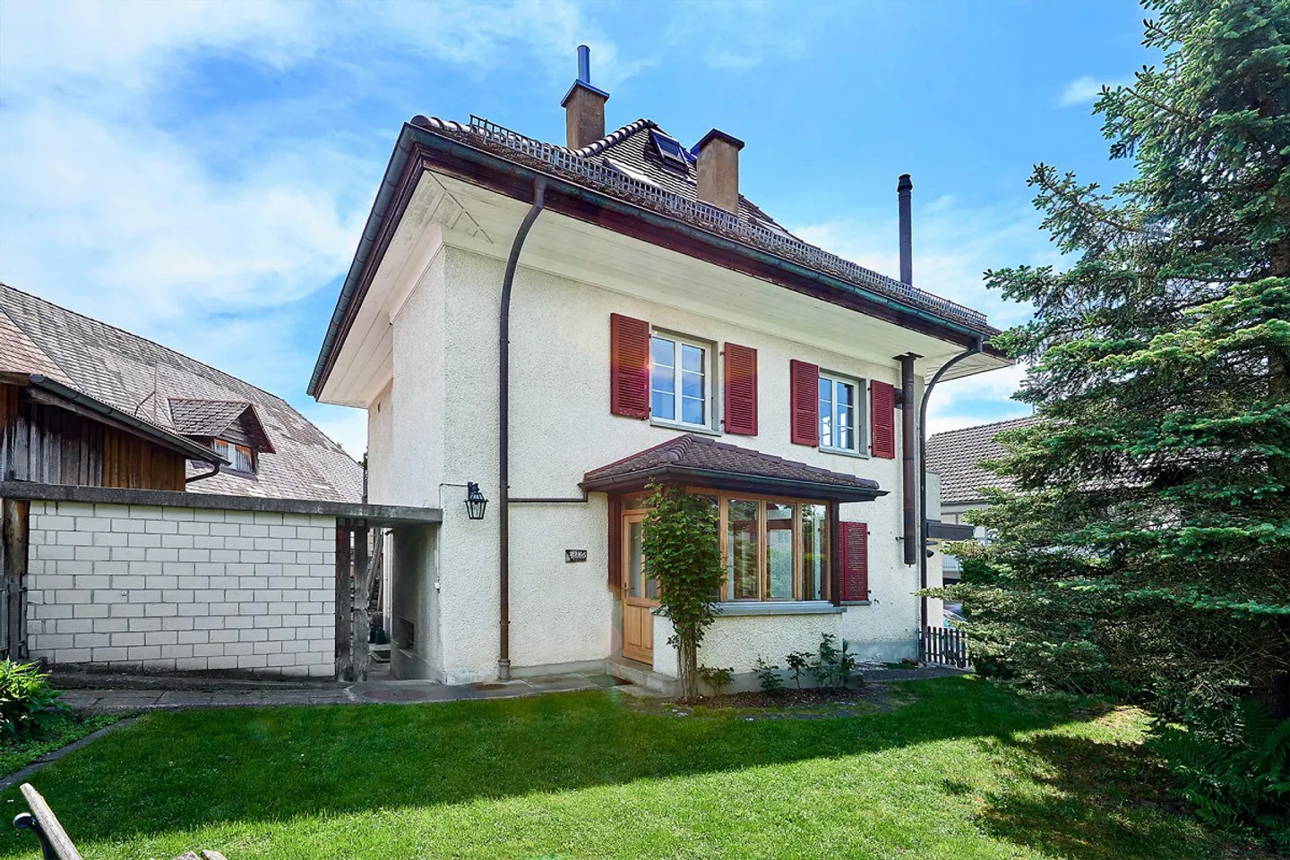 Immeuble résidentiel et commercial, centre du village de Niederscherli - Photo 3 sur 23