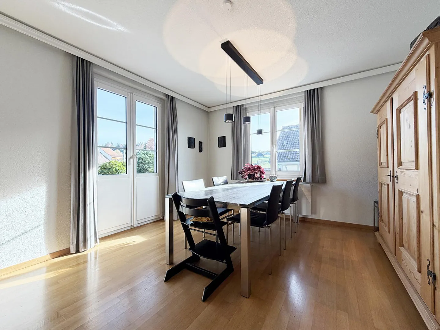 Immeuble résidentiel et commercial, centre du village de Niederscherli - Photo 7 sur 23