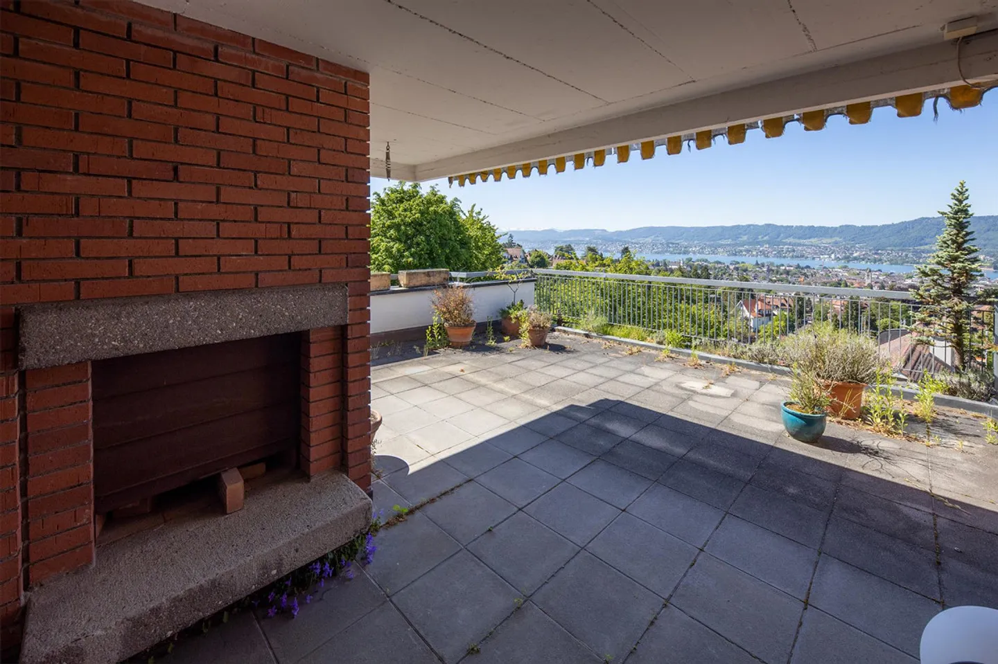 Breathtaking panoramic view over the lake, the city, and the Alps - Photo 12 of 16
