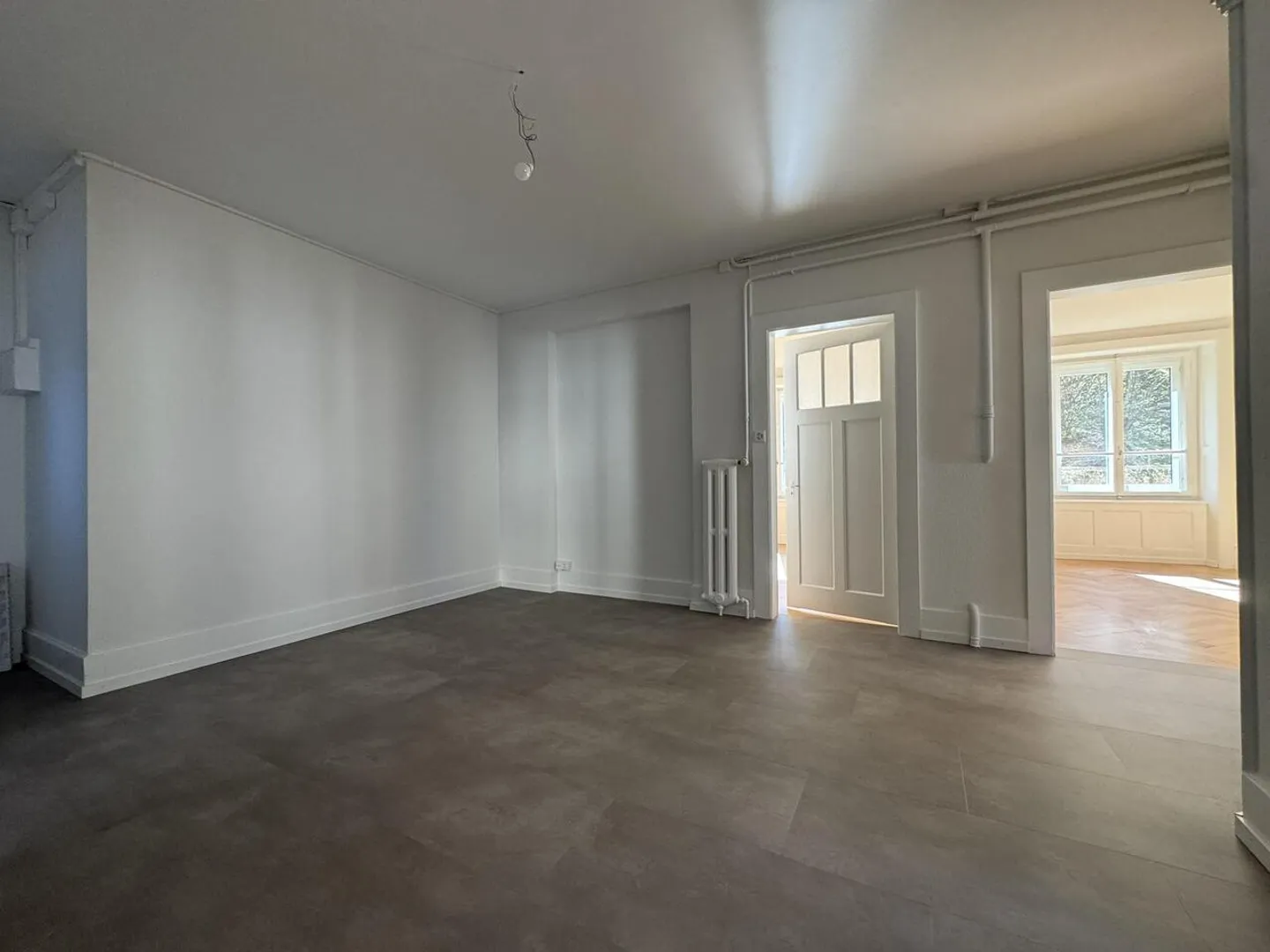 Superbe 4.5 pièces rénové avec parquet en chevrons – 1er loyer offert - Photo 2 of 7