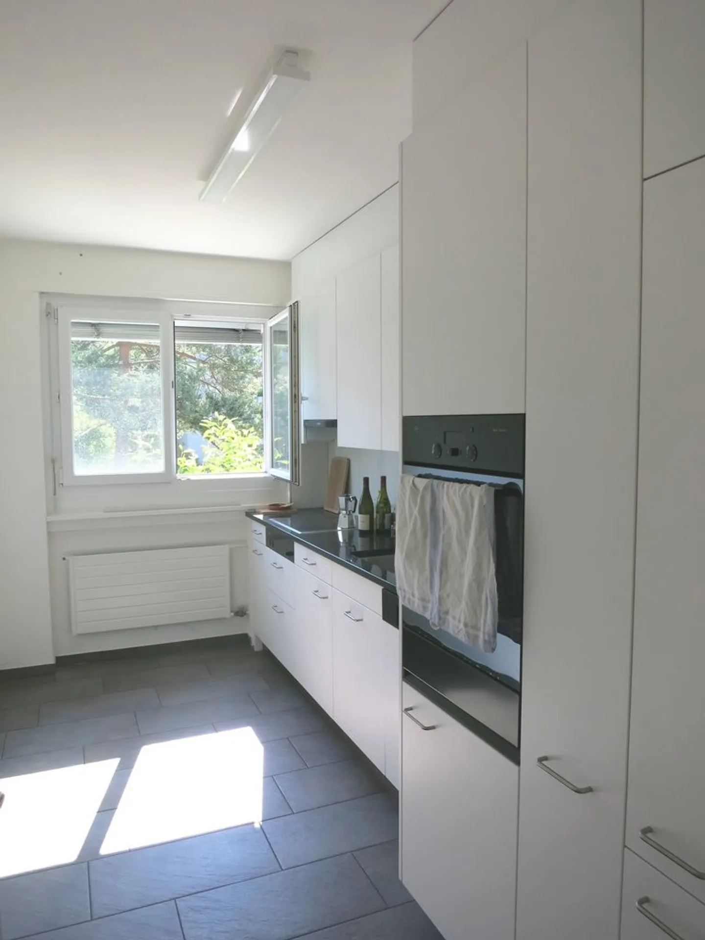 Beautiful 5-room apartment on the raised ground floor in Zollikon - Photo 3 of 7