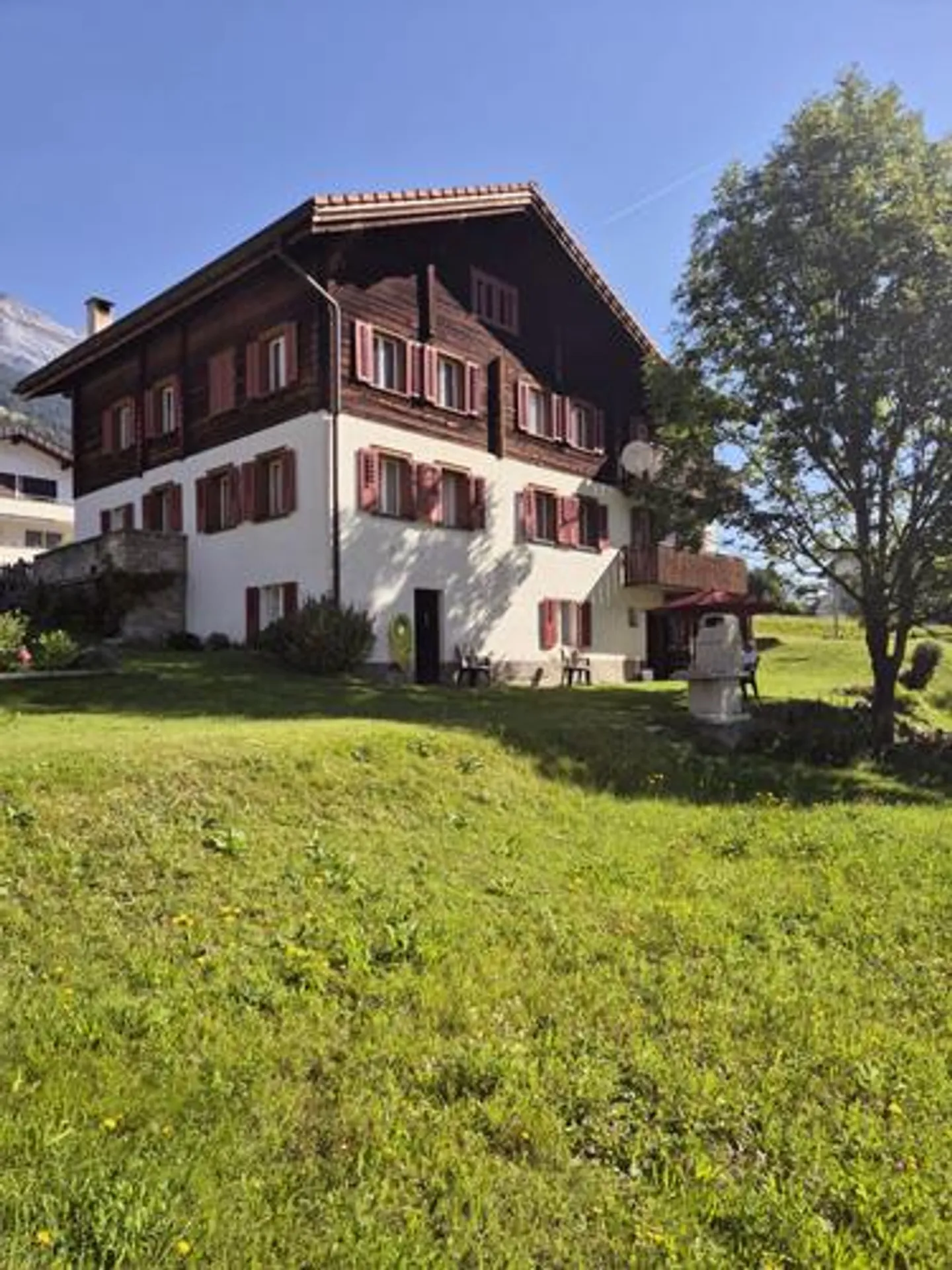 The traditional two-family house in Rabius, in the Grisons Oberland - Photo 1 of 14