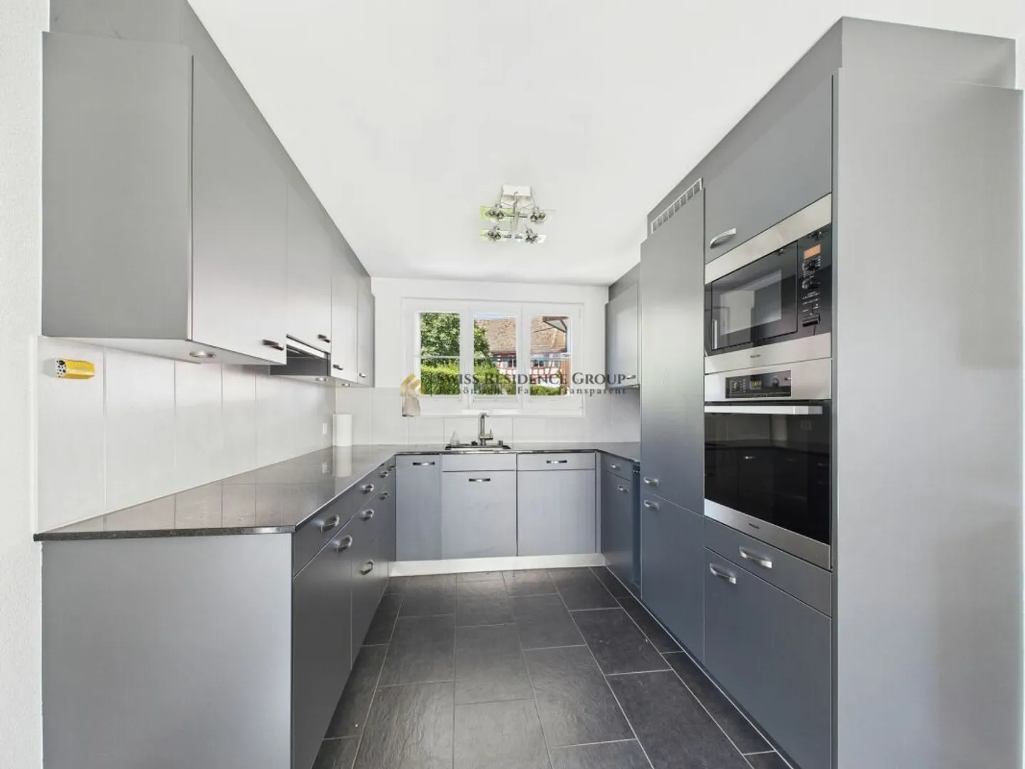 Une maison à tomber amoureux : Maison individuelle avec jardin généreux à Neerach - Photo 3 sur 14