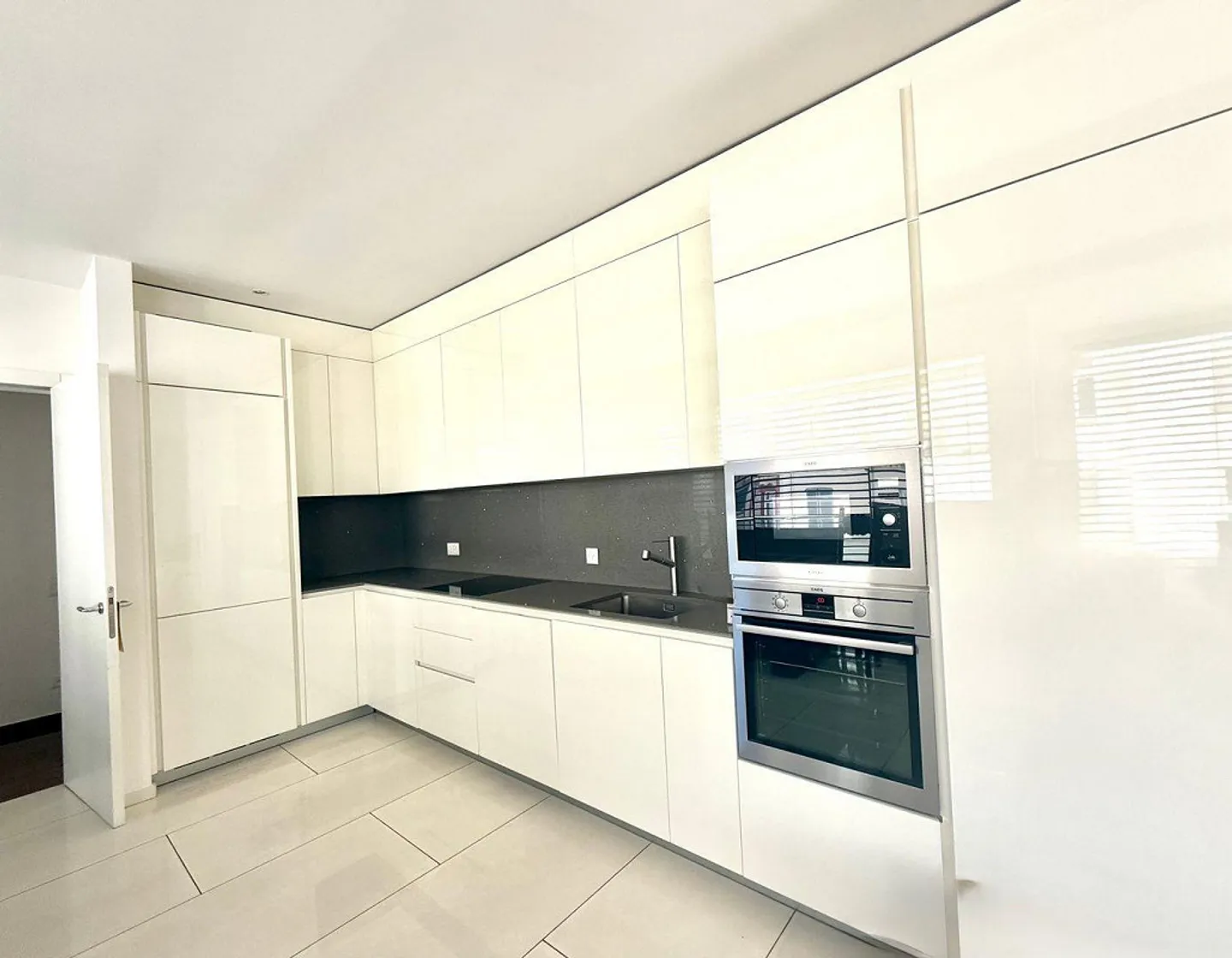 Élégant appartement 3,5 pièces à Lugano - Photo 3 sur 9