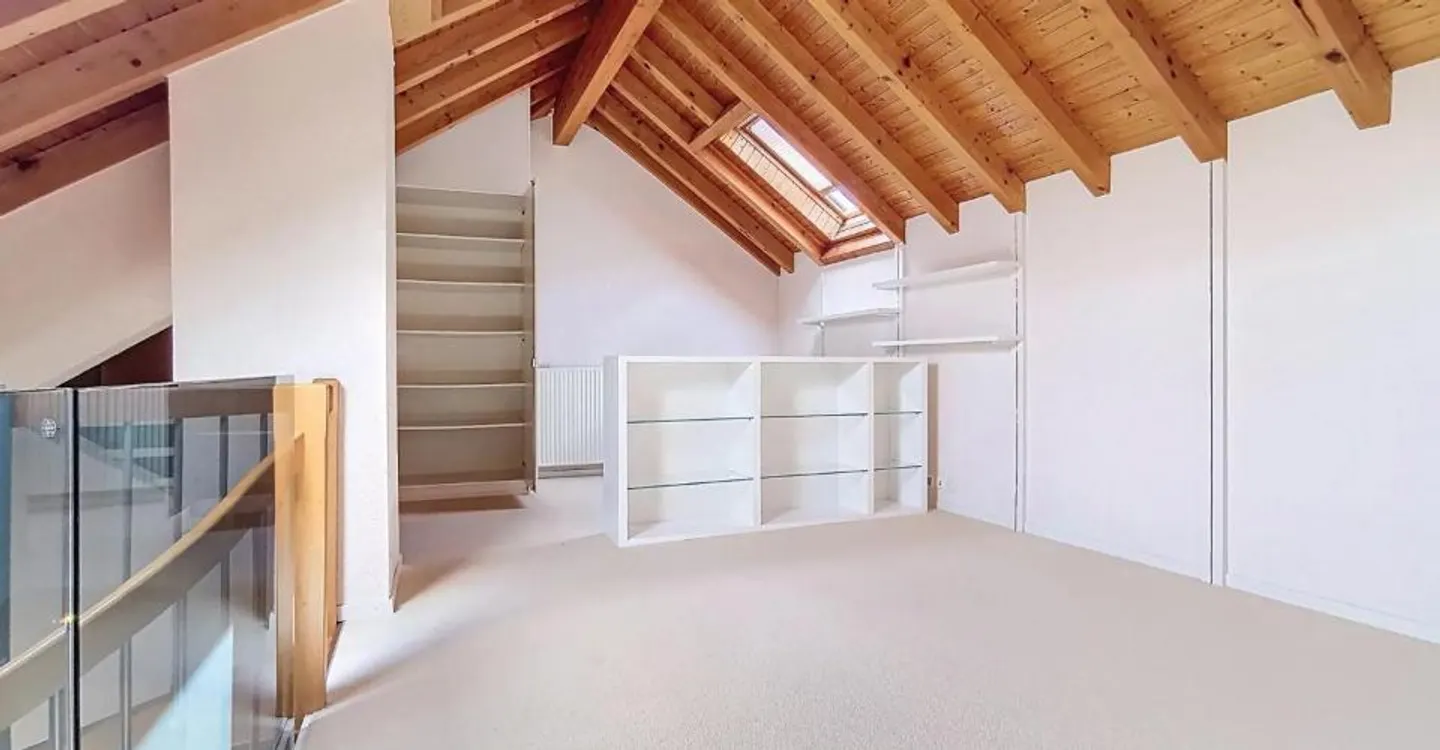 Appartement de caractère avec mezzanine - Photo 6 sur 6