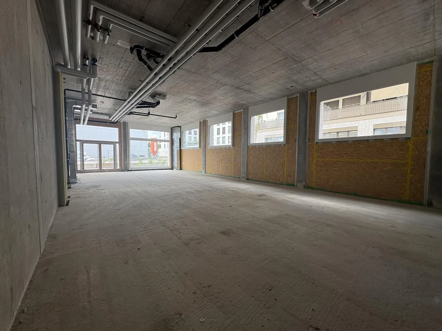 Gewerbefläche zur Miete im neuen Öko-Viertel in Marly! - Foto 2 von 5