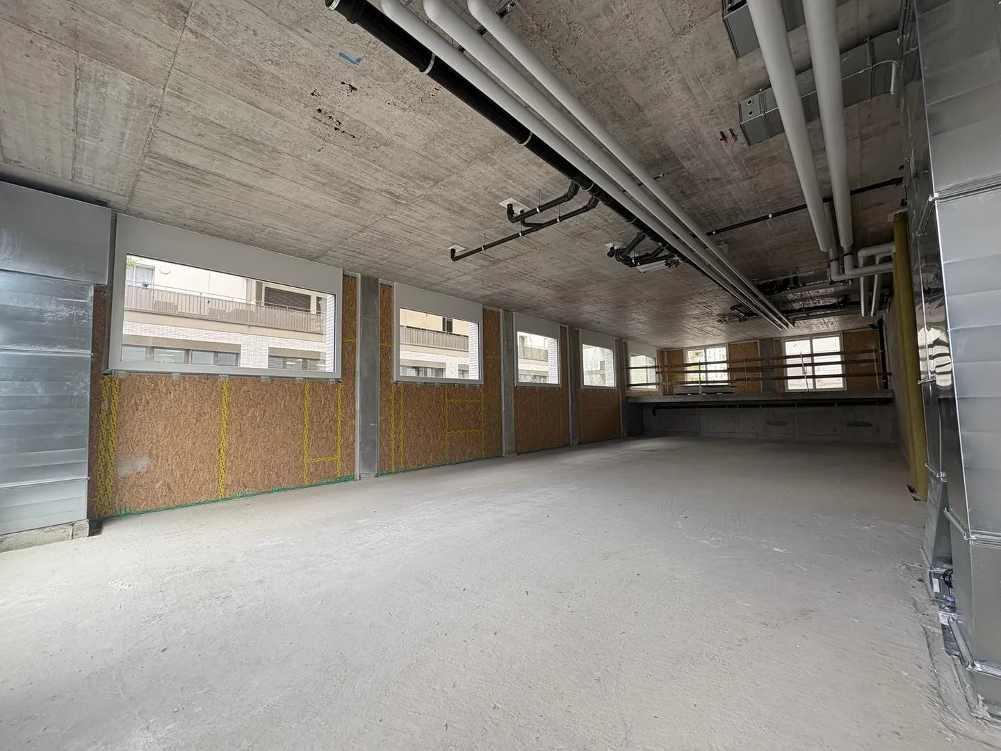 Gewerbefläche zur Miete im neuen Öko-Viertel in Marly! - Foto 3 von 5