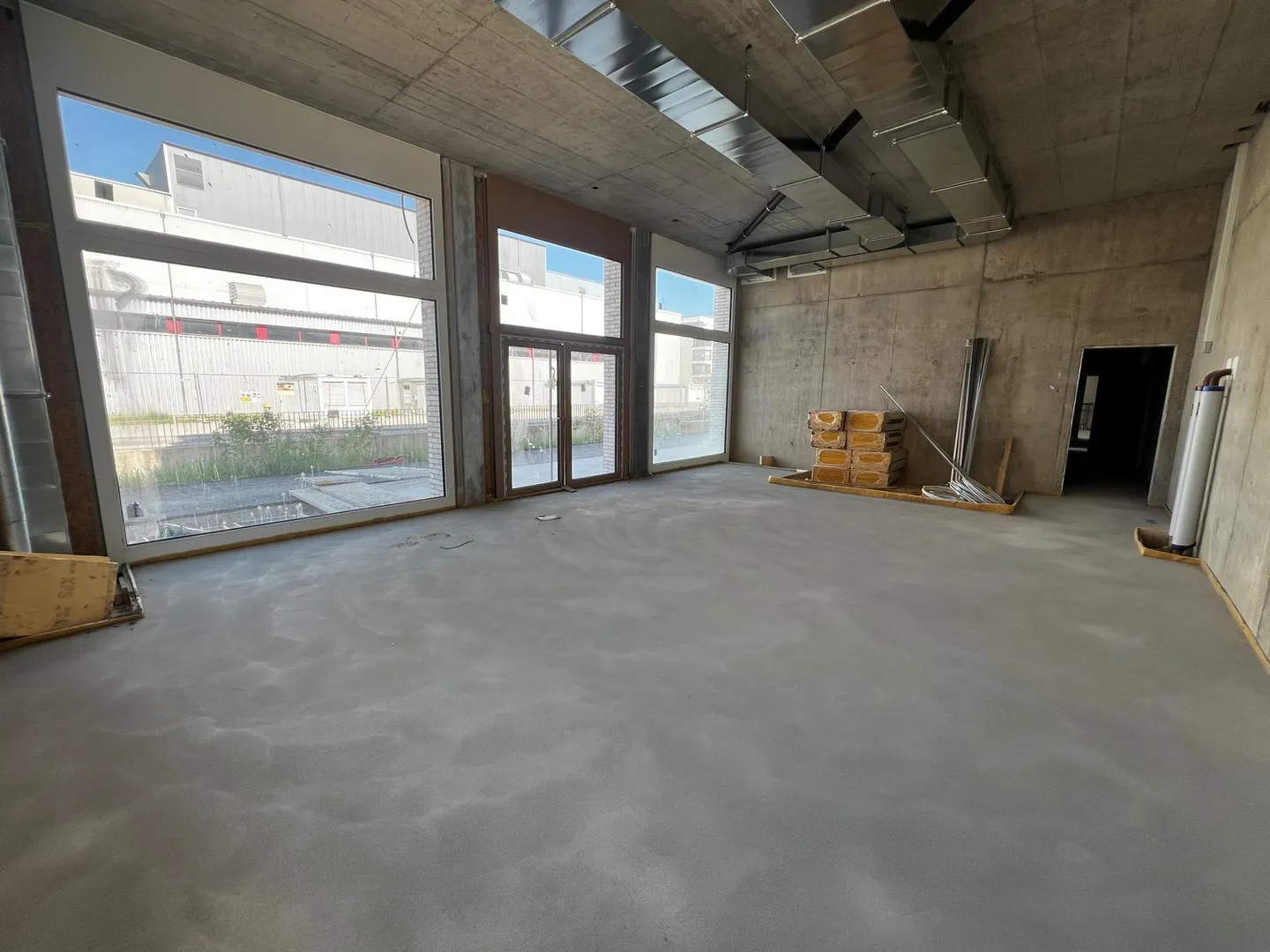 Gewerbefläche zur Miete im neuen Öko-Viertel in Marly! - Foto 2 von 4