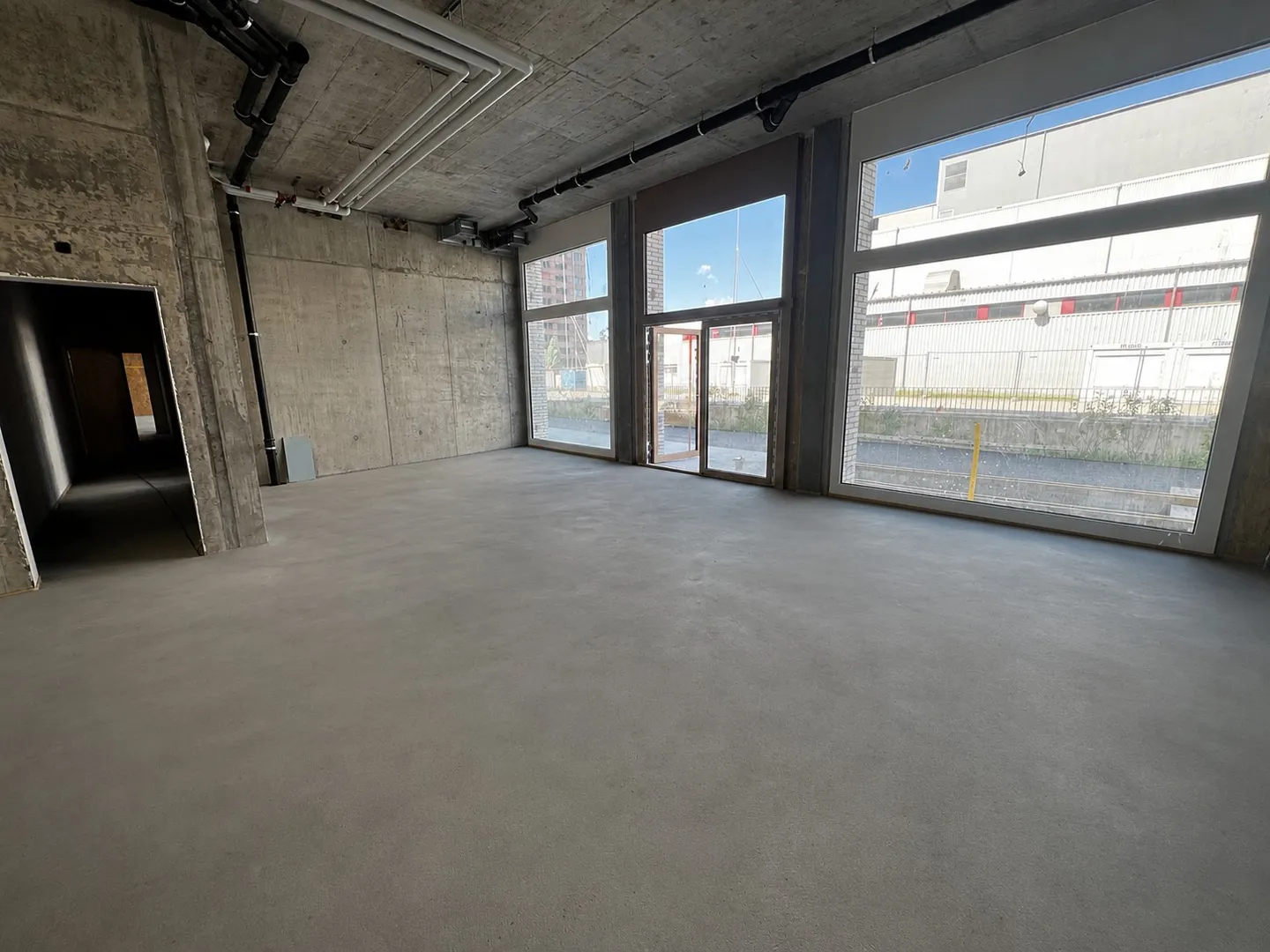 Gewerbefläche zur Miete im neuen Öko-Viertel in Marly! - Foto 2 von 4