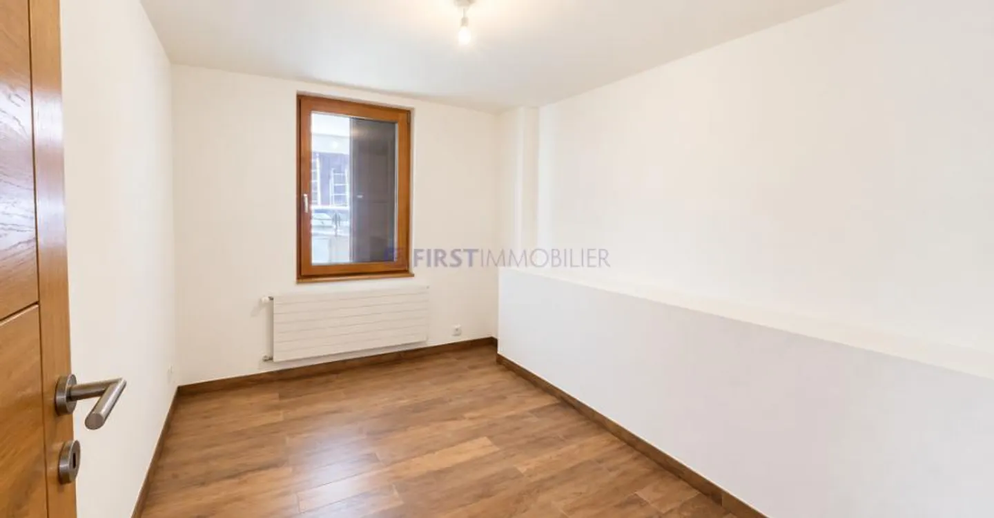 Appartement spacieux avec terrasse - Photo 6 sur 12