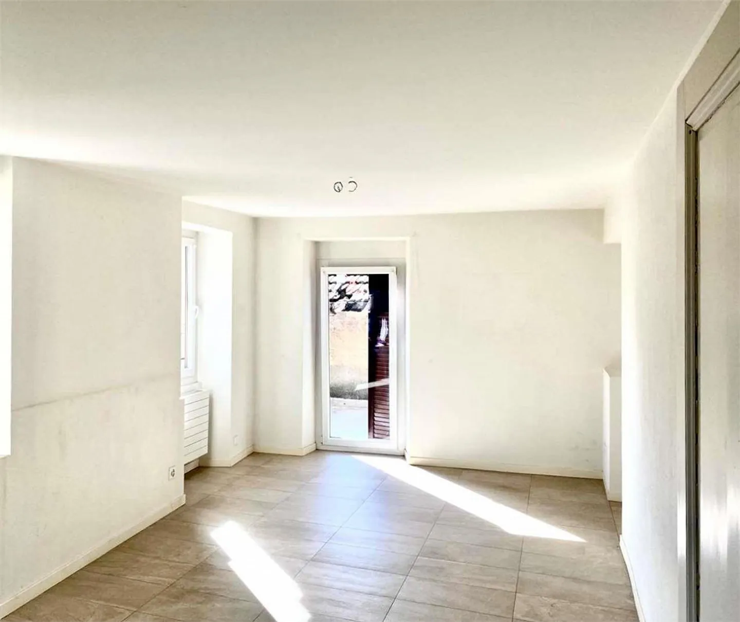 Modern 4.5-room apartment with lake view in Curio - Photo 5 of 11