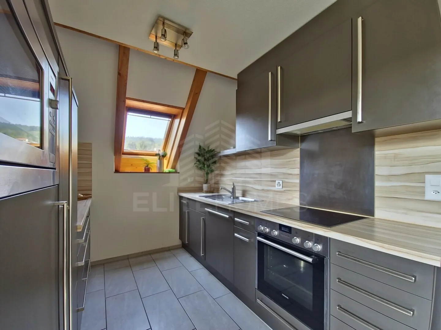 Élégant Appartement en Duplex - Photo 5 sur 6