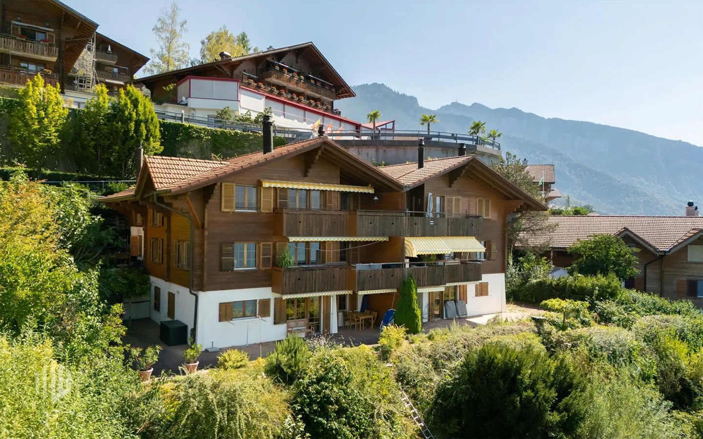 Charmante Dachwohnung mit Seeblick - Foto 1 von 8