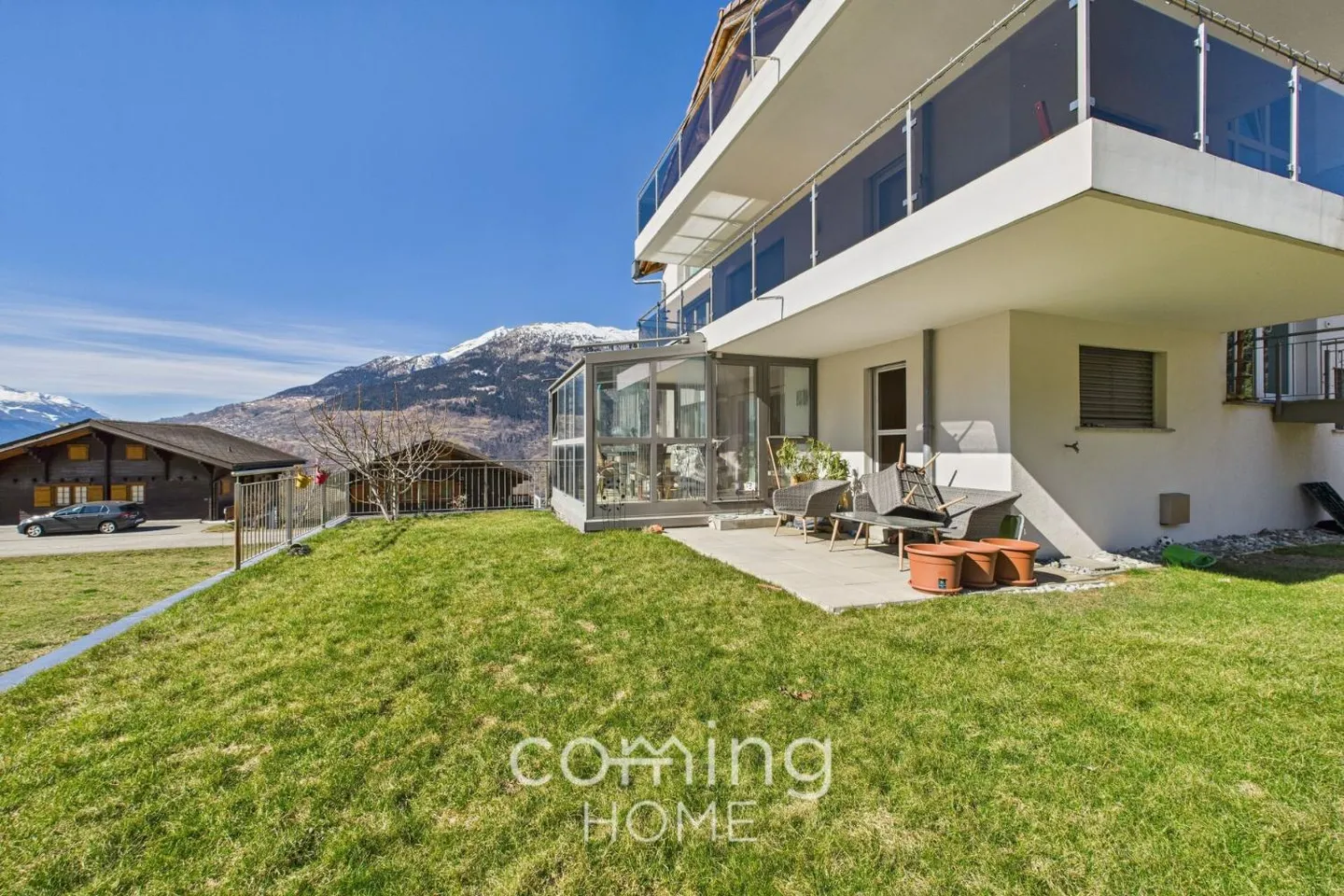 Stylish 5.5-room garden apartment with winter garden and mountain view in Ried-Brig - Photo 1 of 7
