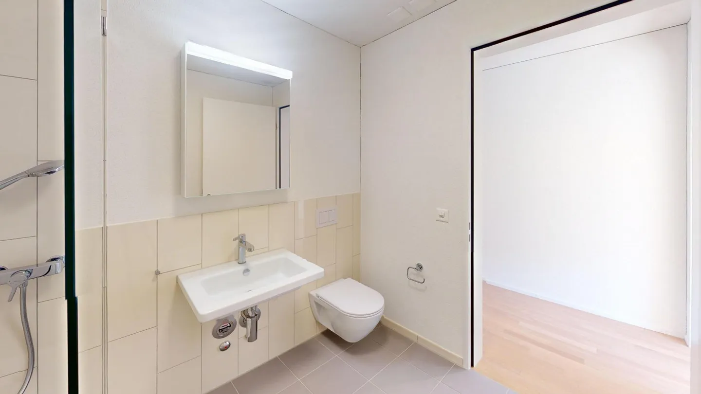 Spacious 2.5-room apartment in the new Younic building - Photo 1 of 6