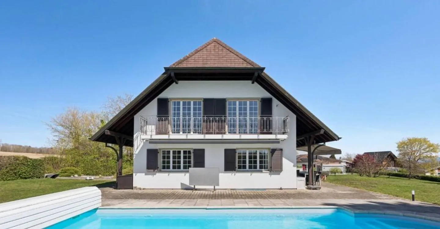 Comfort and Serenity: Renovated Family Home with Pool and Outdoor Space - Photo 1 of 8