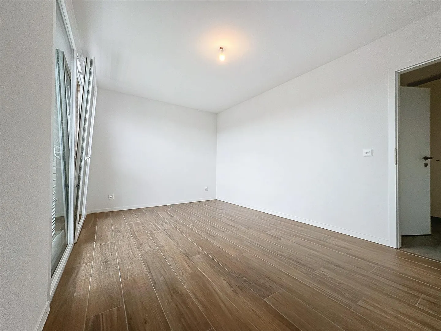 Appartement 2.5 pièces - Photo 3 sur 7