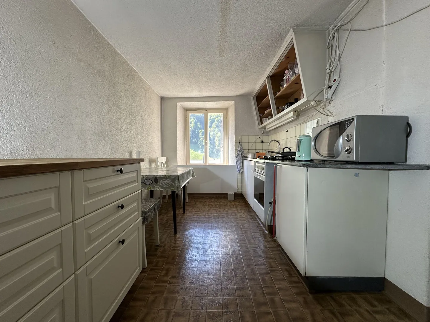 Casa a schiera spaziosa con fascino e potenziale - Foto 4 di 14