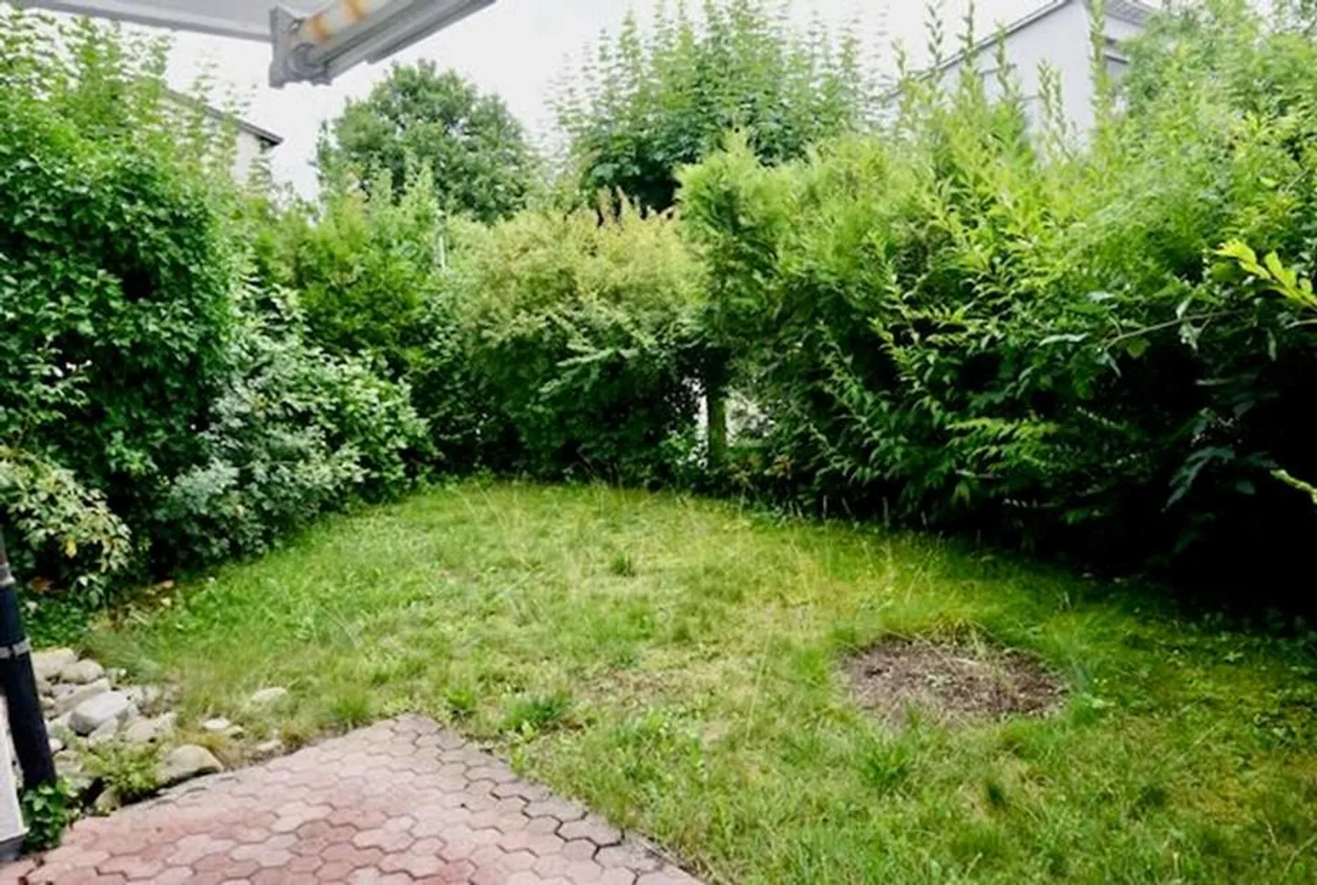 Bell'appartamento di 3,5 stanze al 1° piano con area giardino e garage - Foto 14 di 18